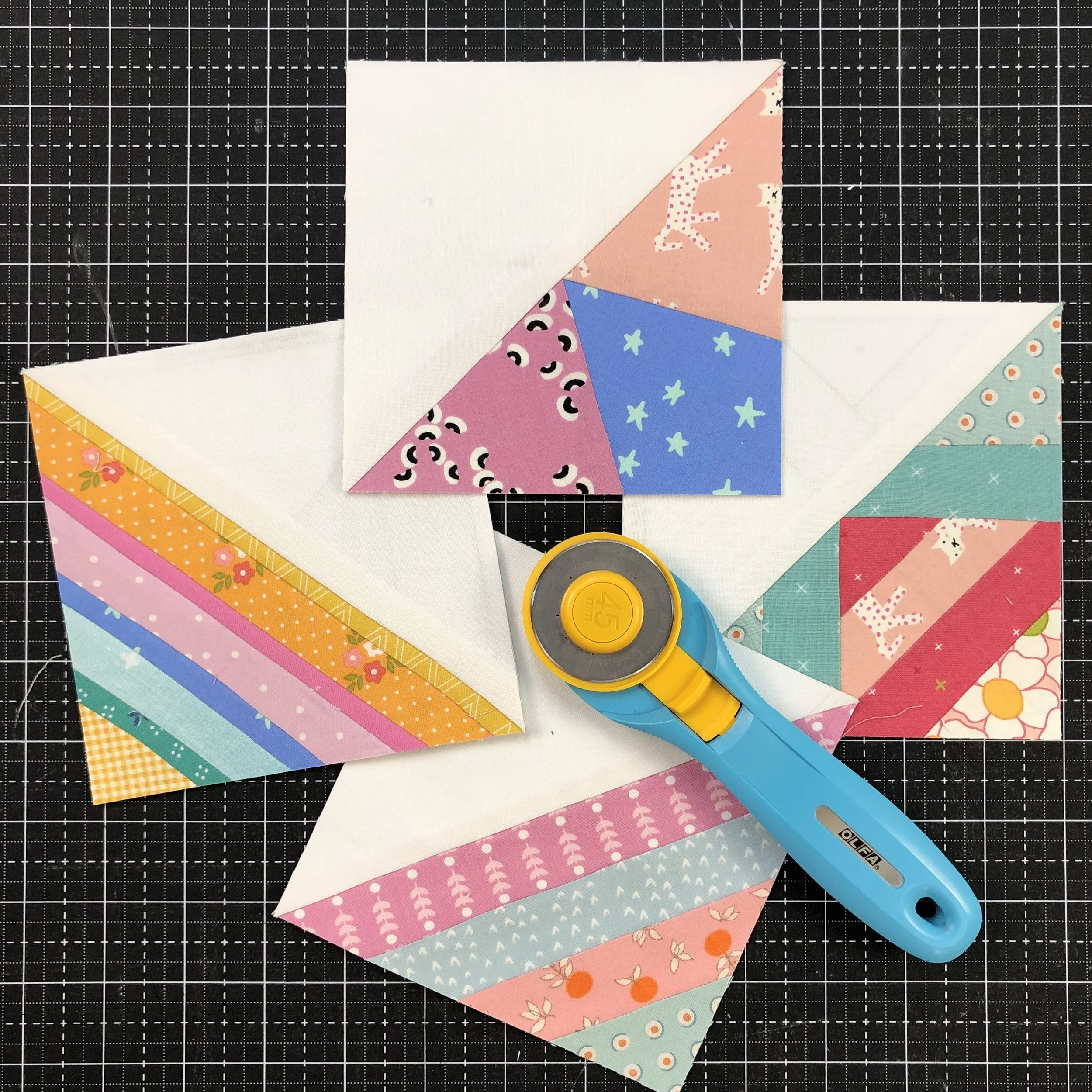 5 inch scrappy triangle quilt blocks.jpeg