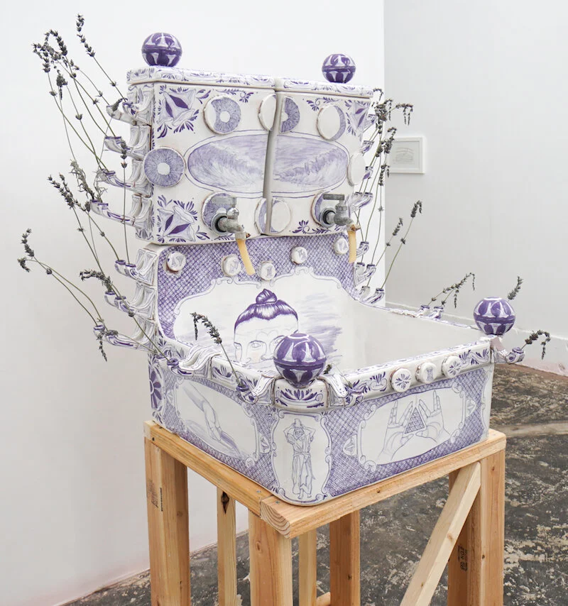 Nicki Green,&nbsp;Splitting/Unifying (toilet tanks, slip spigots and medical sink laver with faucets), 2019,&nbsp;Glazed vitreous china, epoxy, and found slip spigots, 54 x 40 x 36".
