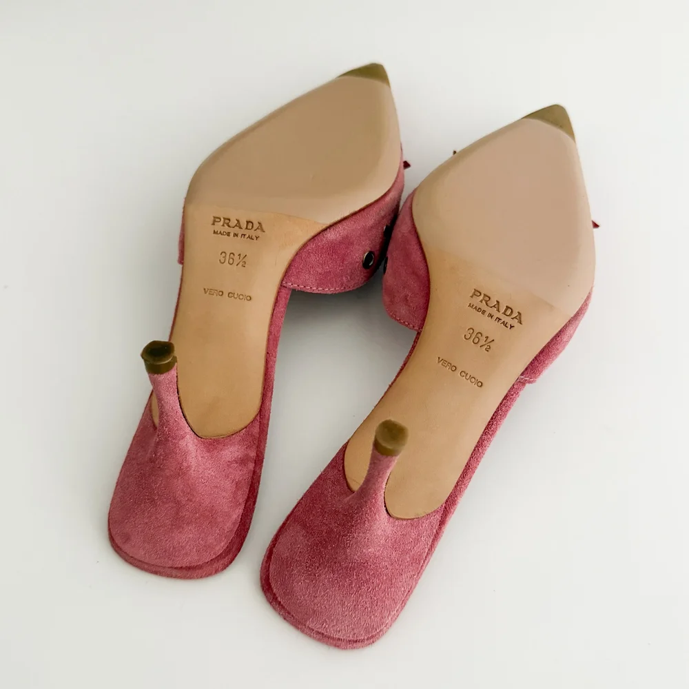Prada Iconic Pink Eyelet Bow Mule Heels (IT 36.5) — sororité.