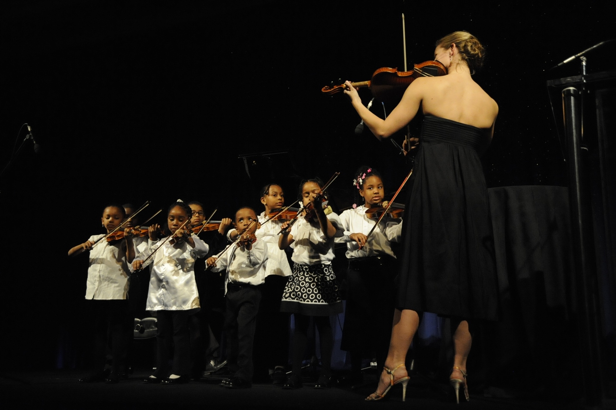 Leading a Suzuki group at the Music Institute Gala