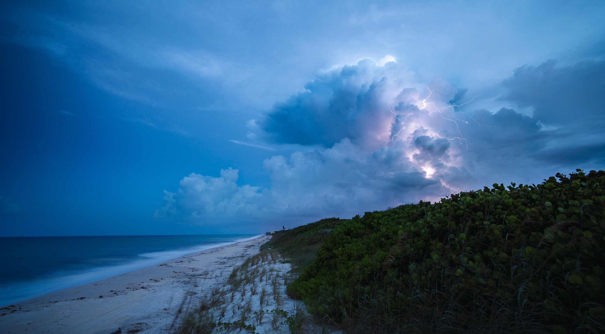  Looking south along Melbourne Beach at a thunderstorm in the days before Hurricane Dorian. It was a tense few days watching the Category 5 storm move slowly towards Florida while it decimated the northern islands of the Bahamas.  