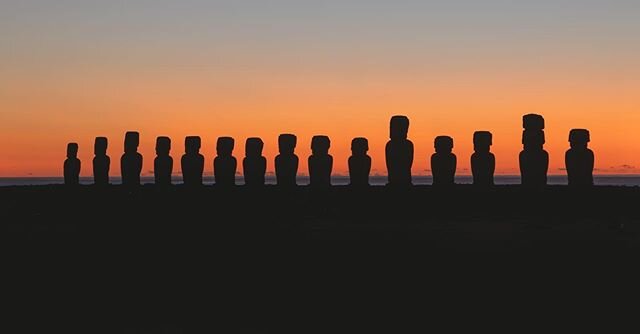 Photo 2 of 3 in series. Sunrise over Ahu Tongariki on Easter Island. This is pretty much as idyllic as a sunrise spot can get...an island in the middle of the Pacific Ocean with the sun coming up behind these giant and mysterious Moai statues. This p