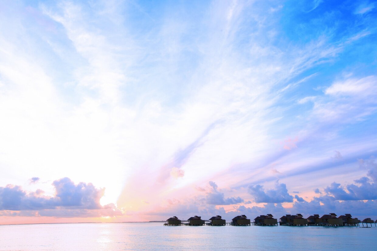 Six_Senses_Laamu_Water_Villa_Sunset_Wave_Collective.jpg