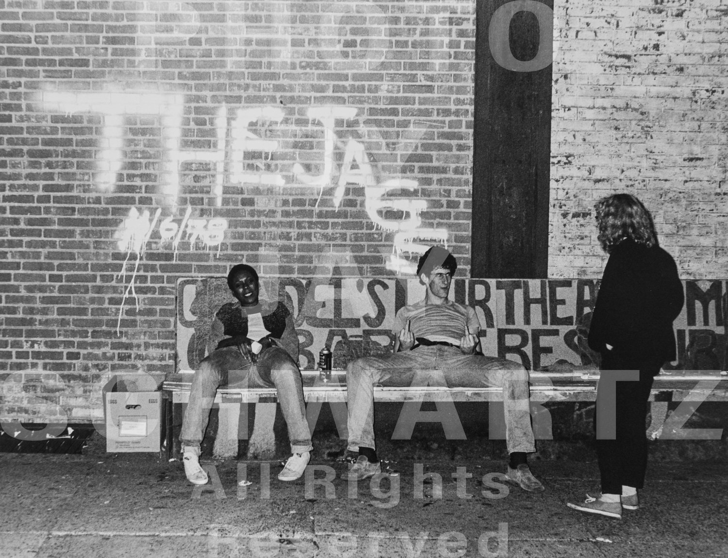 The Jags’ Charly Bright (surrounded by friends Gina McDaniel and Amy Aronson), after playing at Grendel’s Lair across the street, 11/6/78 by Jay Schwartz