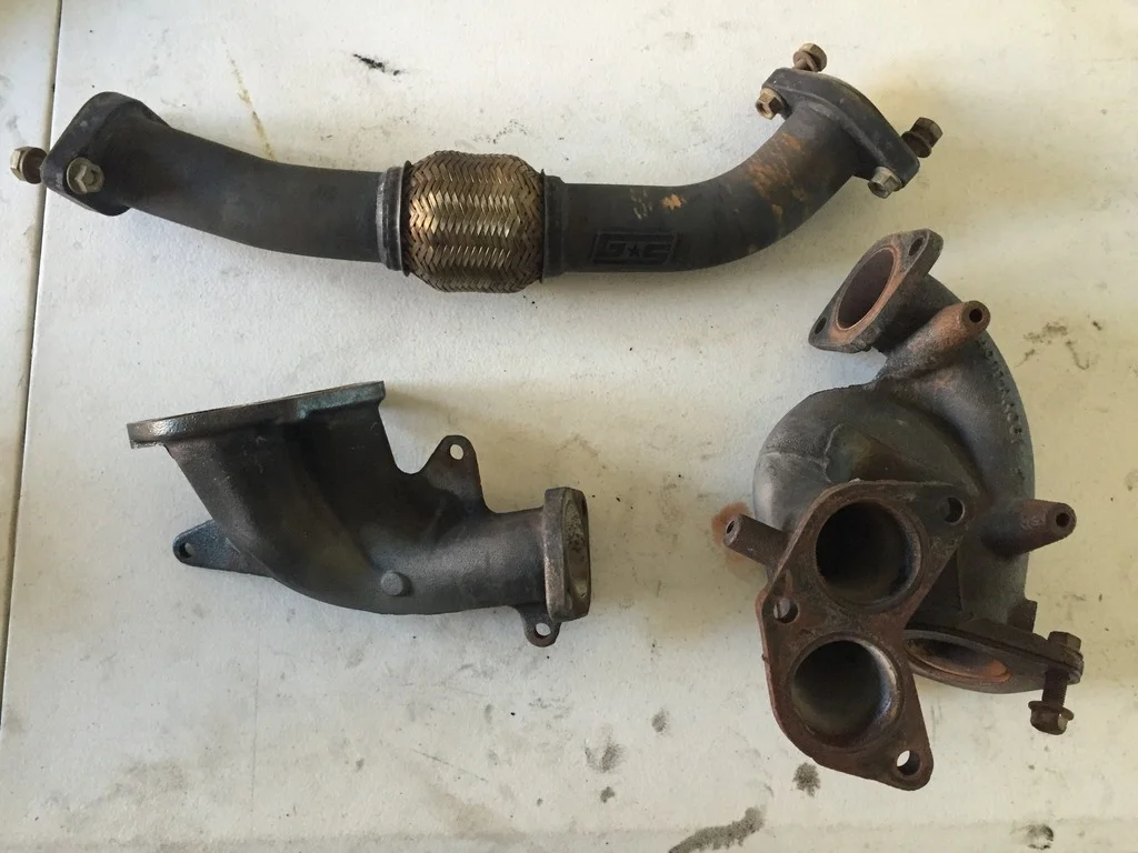 Grimmspeed Port and polished exhaust manifold. Let the rumble flow through you! 