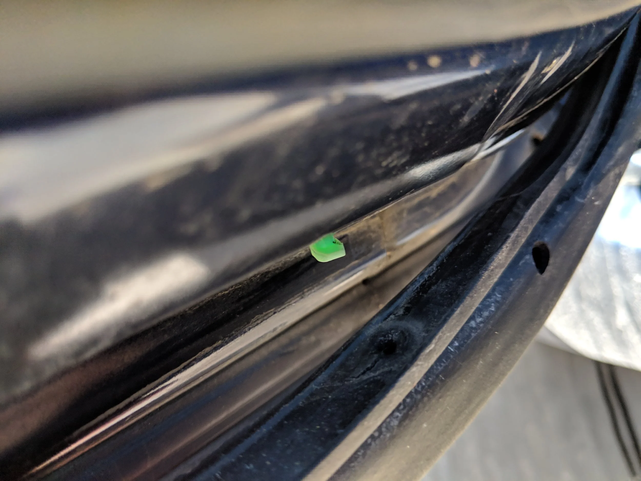 Clip and hanging seal. Look closely and see the torn seal.