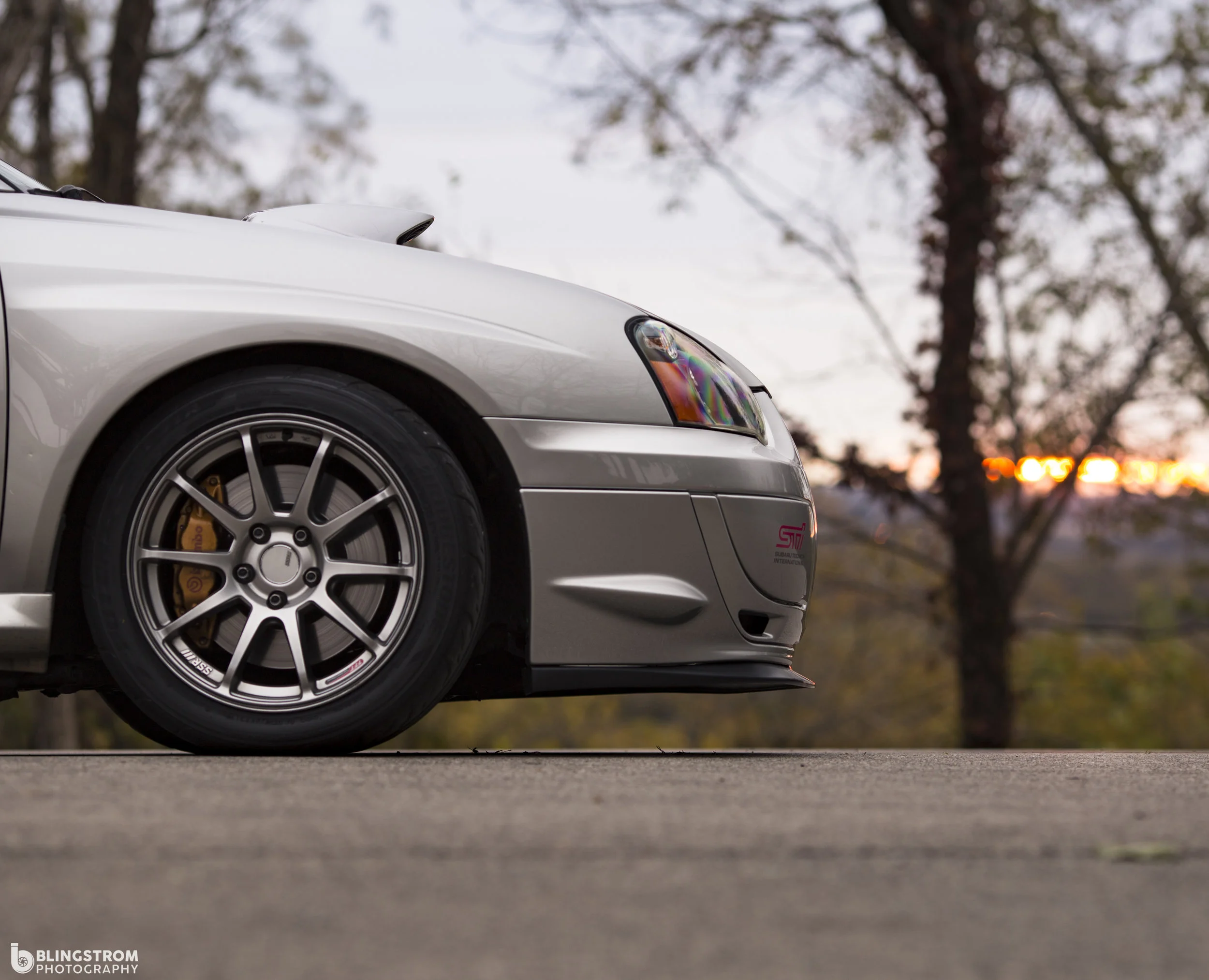 Clearance to fit over stock Sti brembos.