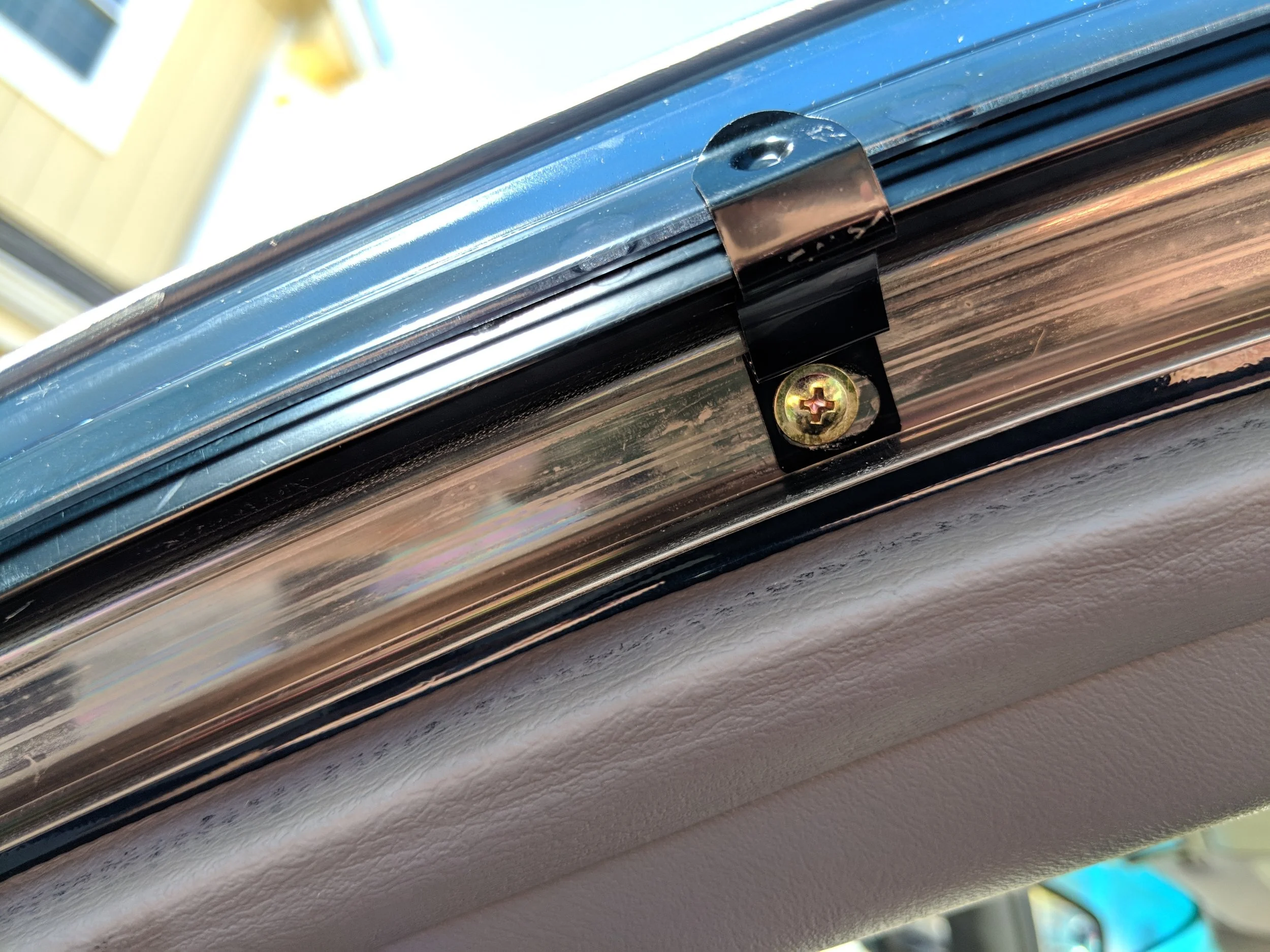 This is where the screw is on the A-pillar.