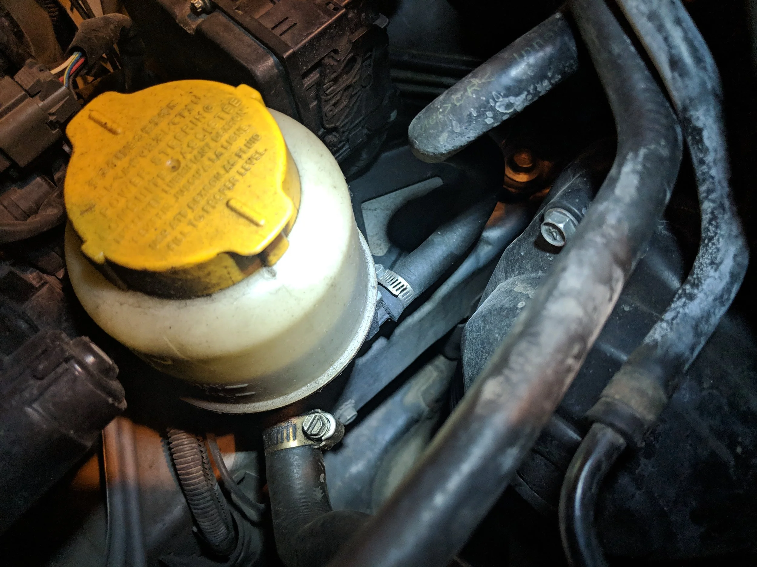 These two connections points are noted for allowing air to be sucked in or fluid to leak out. I replaced them with worm style clamps which aren’t the best but get the job done.