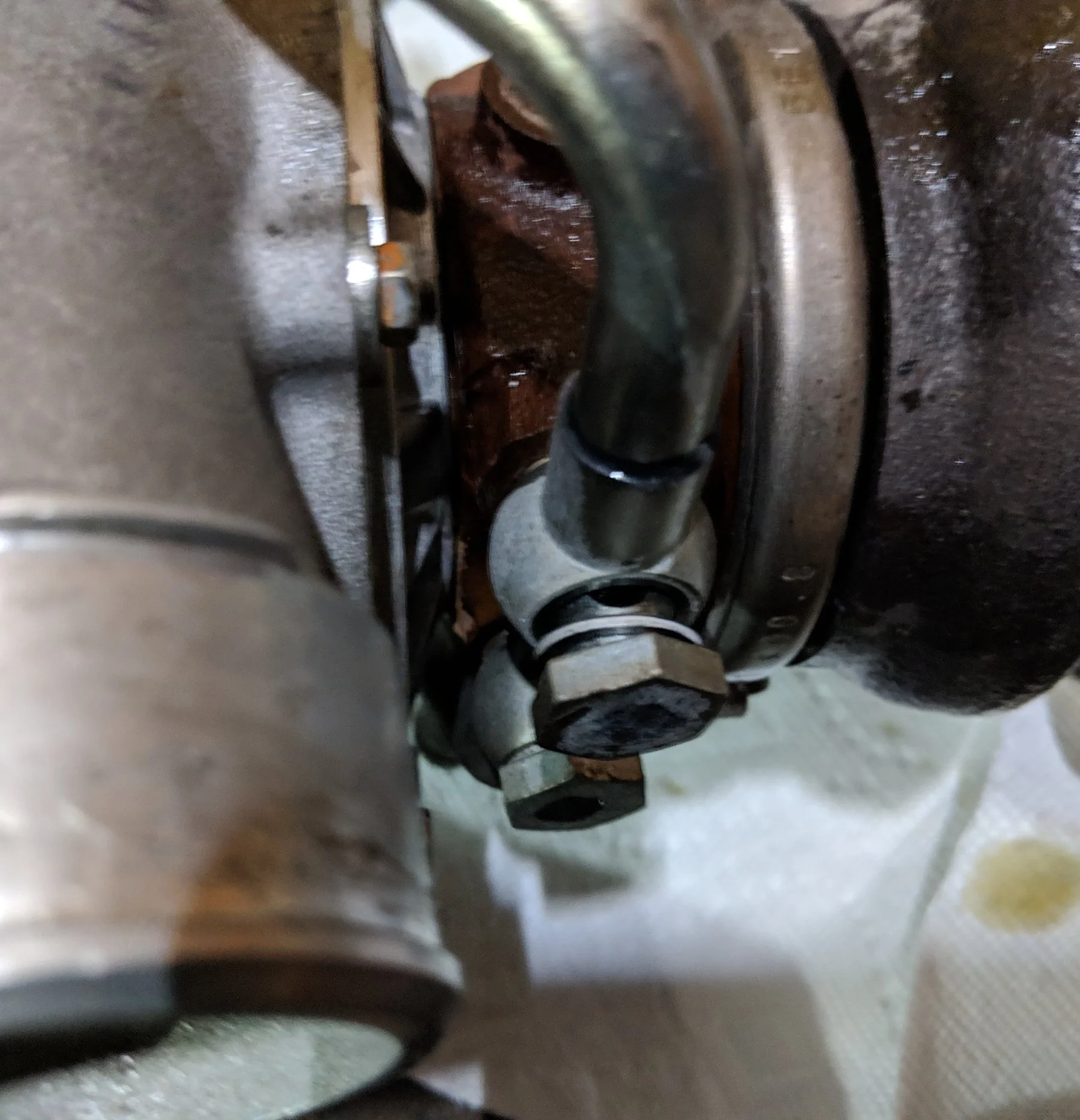 Two coolant banjo bolts to remove.