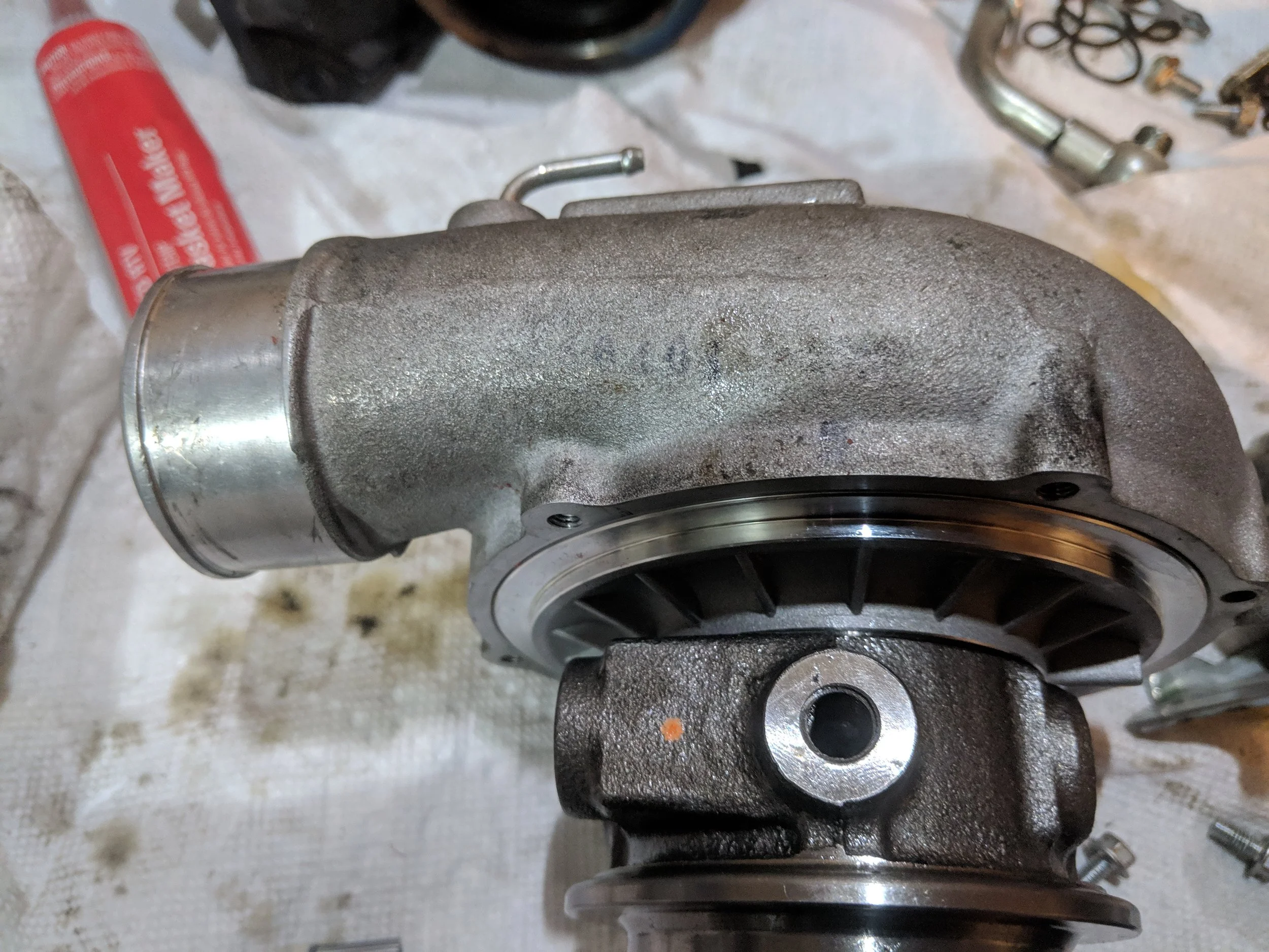 Hard to see in the image but there is a light mark straight up from the oil feed hole. Making your rebuild that much easier.
