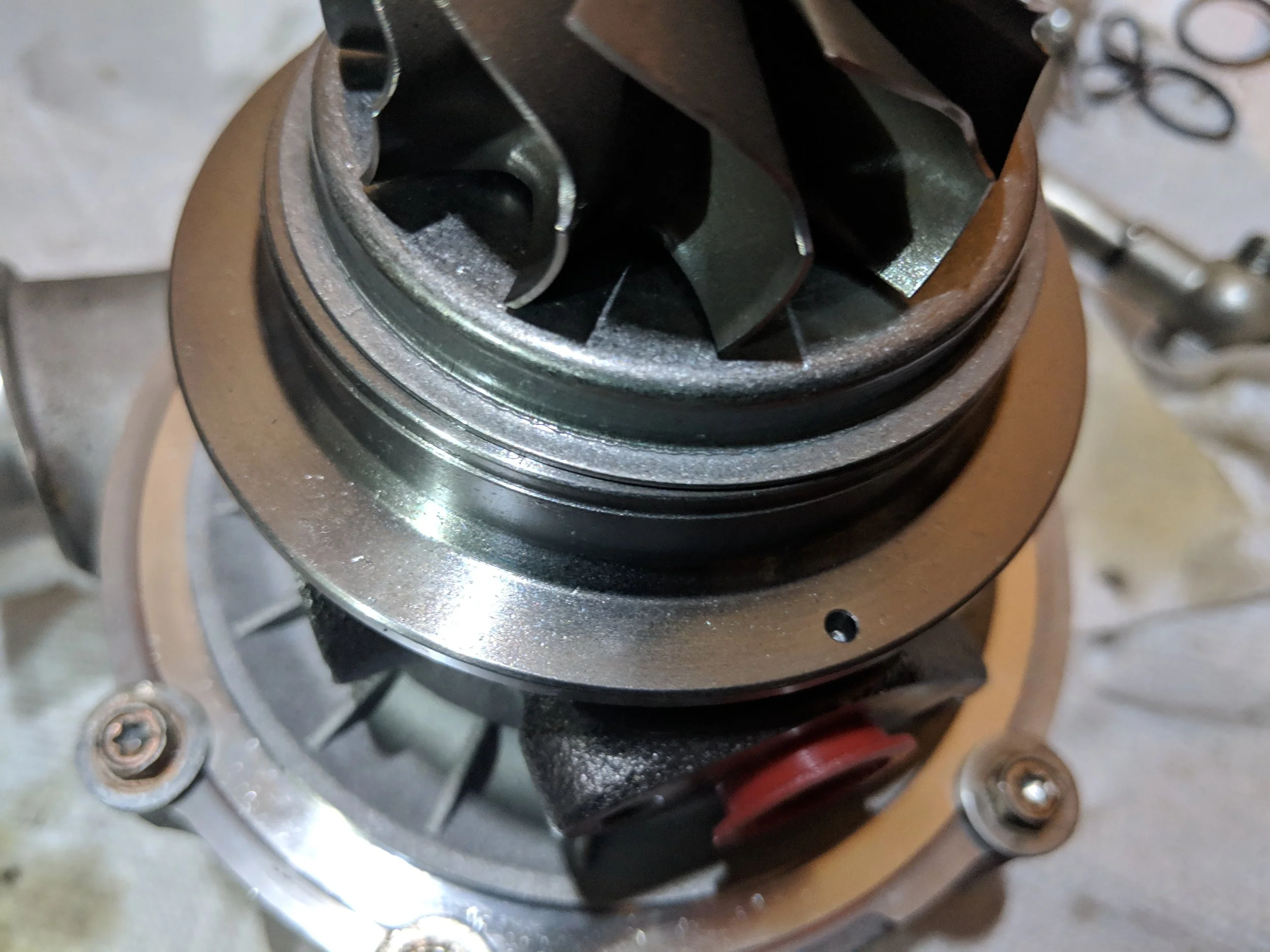 CHRA hole is located on the bottom helps you line up the hotsides dowel pin.