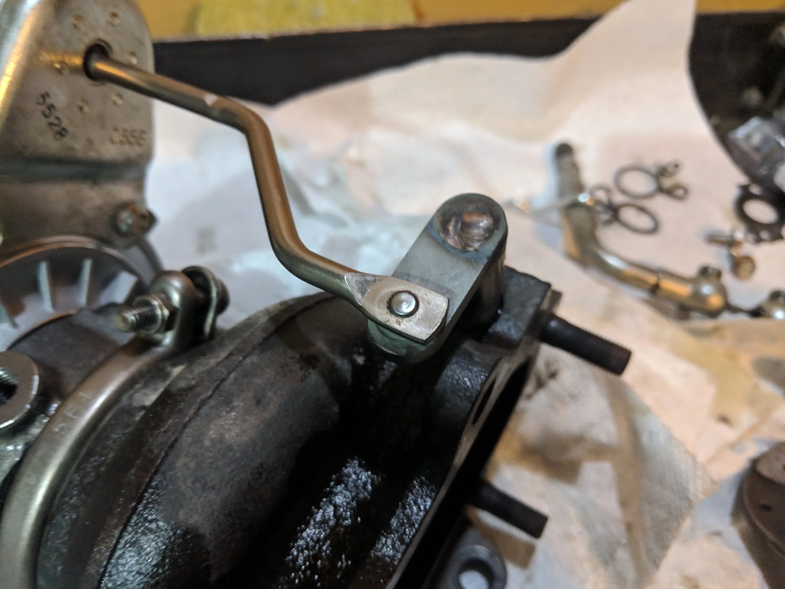 Wastegate arm back on. Snap the circlip back in place to keep everything in place.