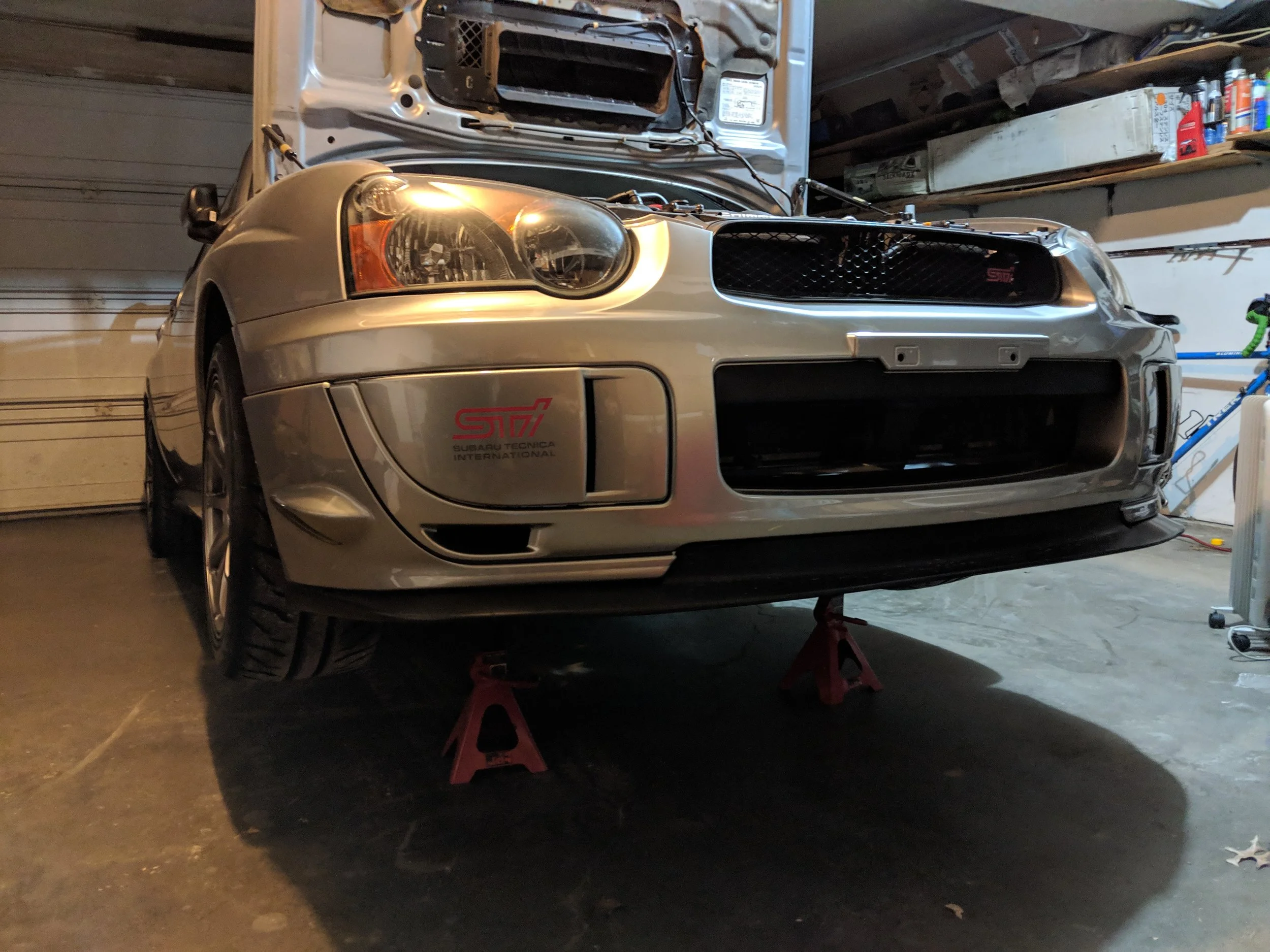 I use the factory U-brace for my jack locations, right in front of the control arms.