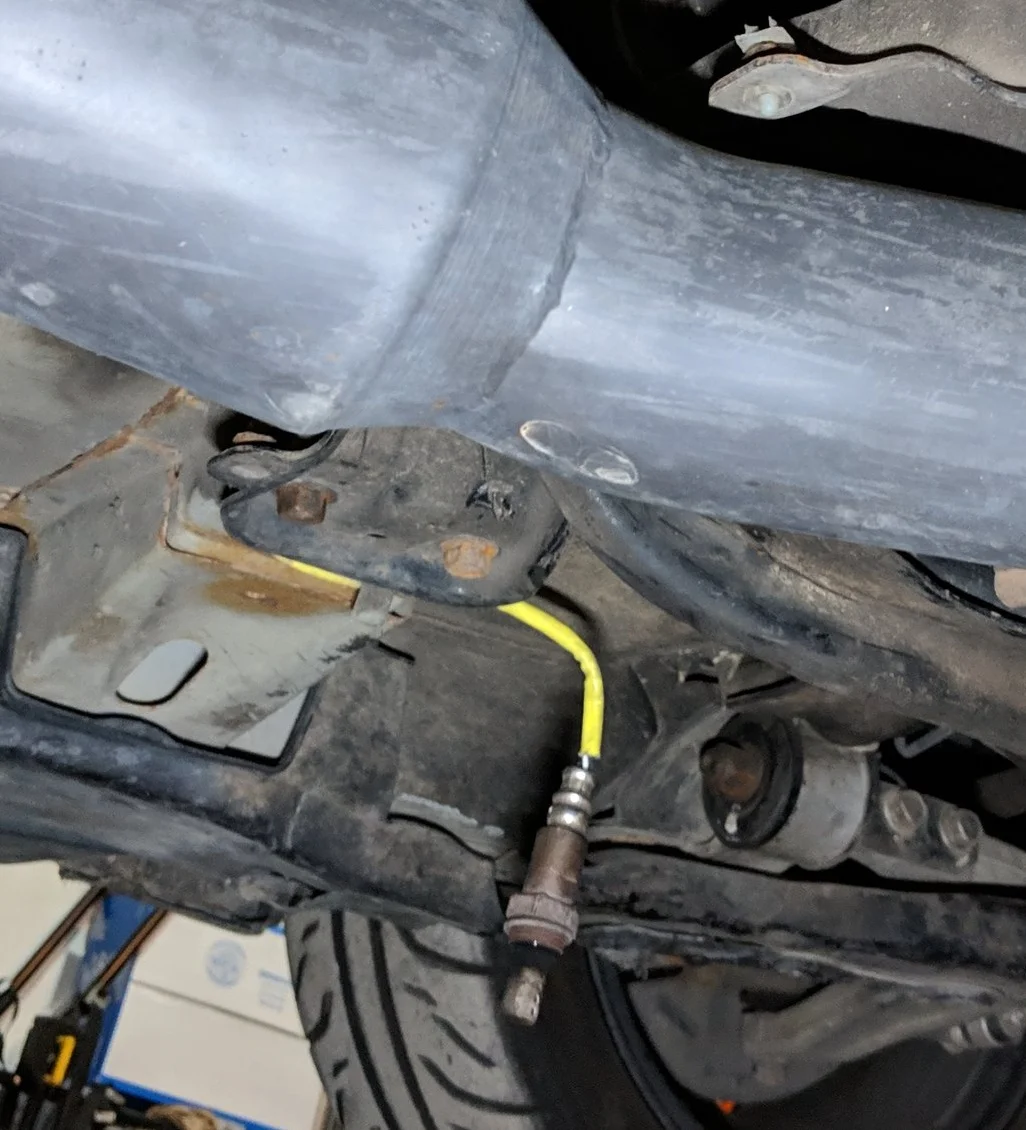 Popping out to say hello, the O2 sensor sensor can hang out literally, or disconnect the harness plug and put it somewhere safe to not damage the very sensitive electronics.