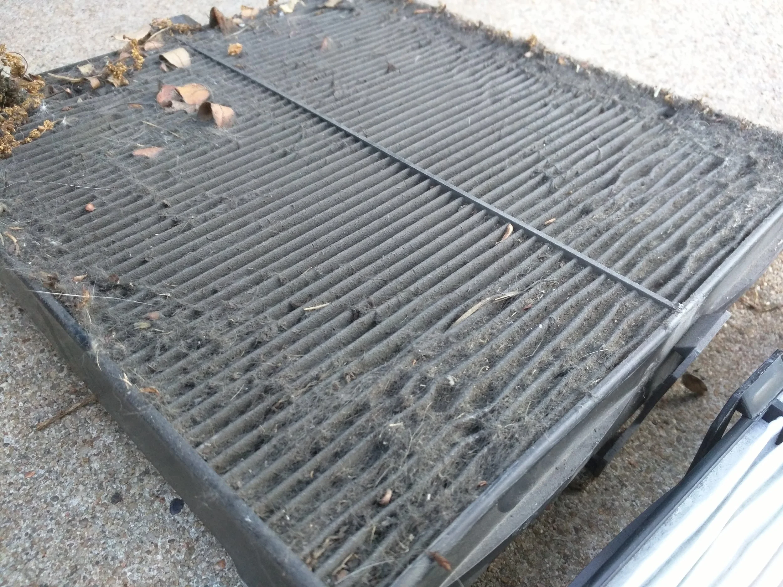 This is my ridiculous cabin filter from the first week of owning my Forester. I am 99% sure it was never changed over the 196k miles before I bought the car.