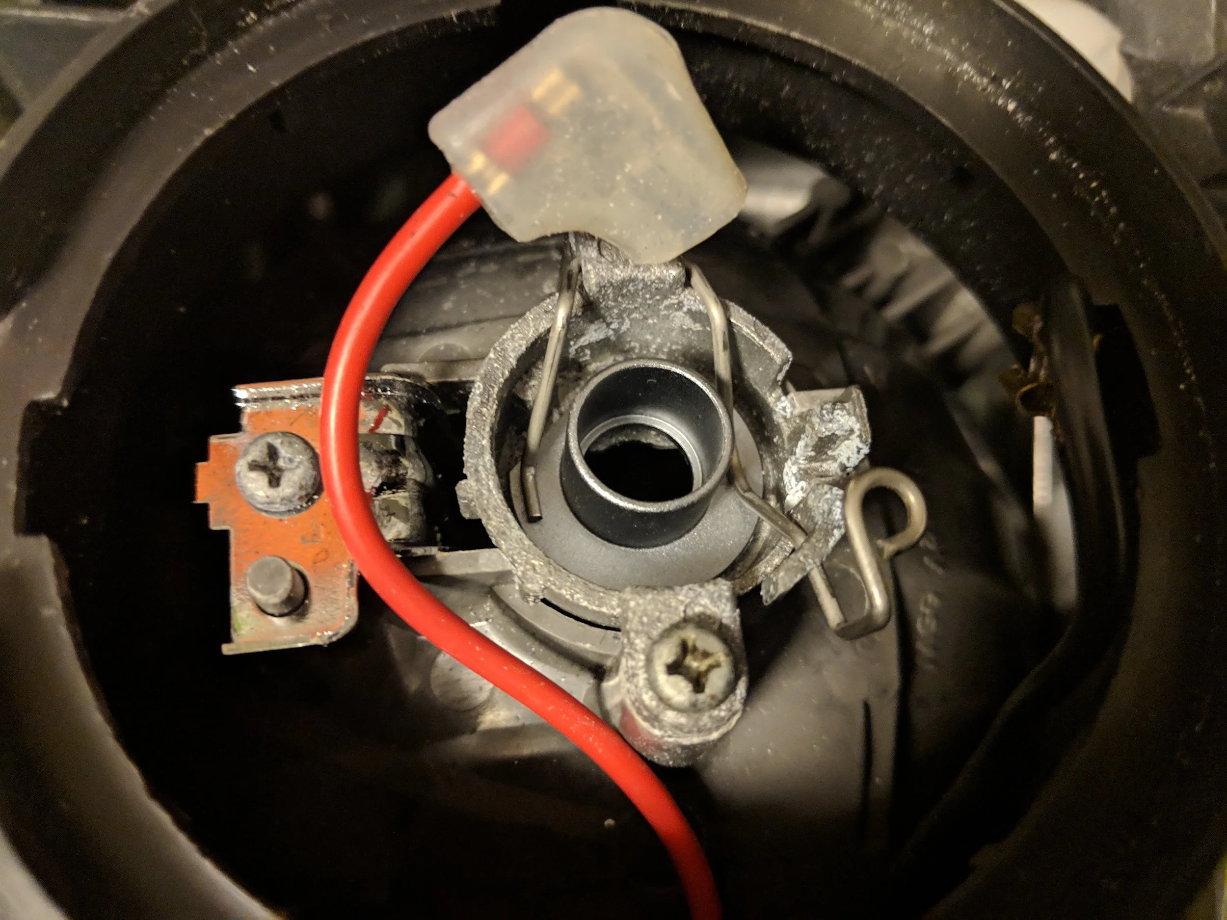 The plate set up and installed. You will slide the bulb in through here.