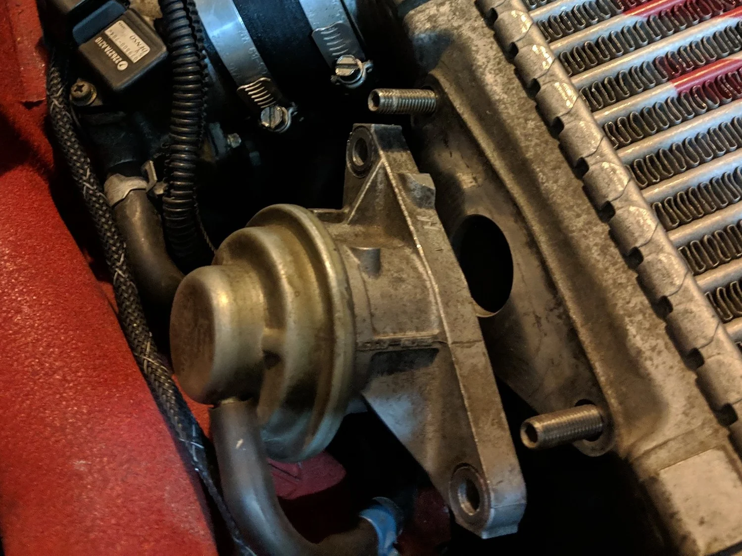 Now take the BPV and mov it towards the intake manifold. Keeping it out of your way when you go to pulling the intercooler out.