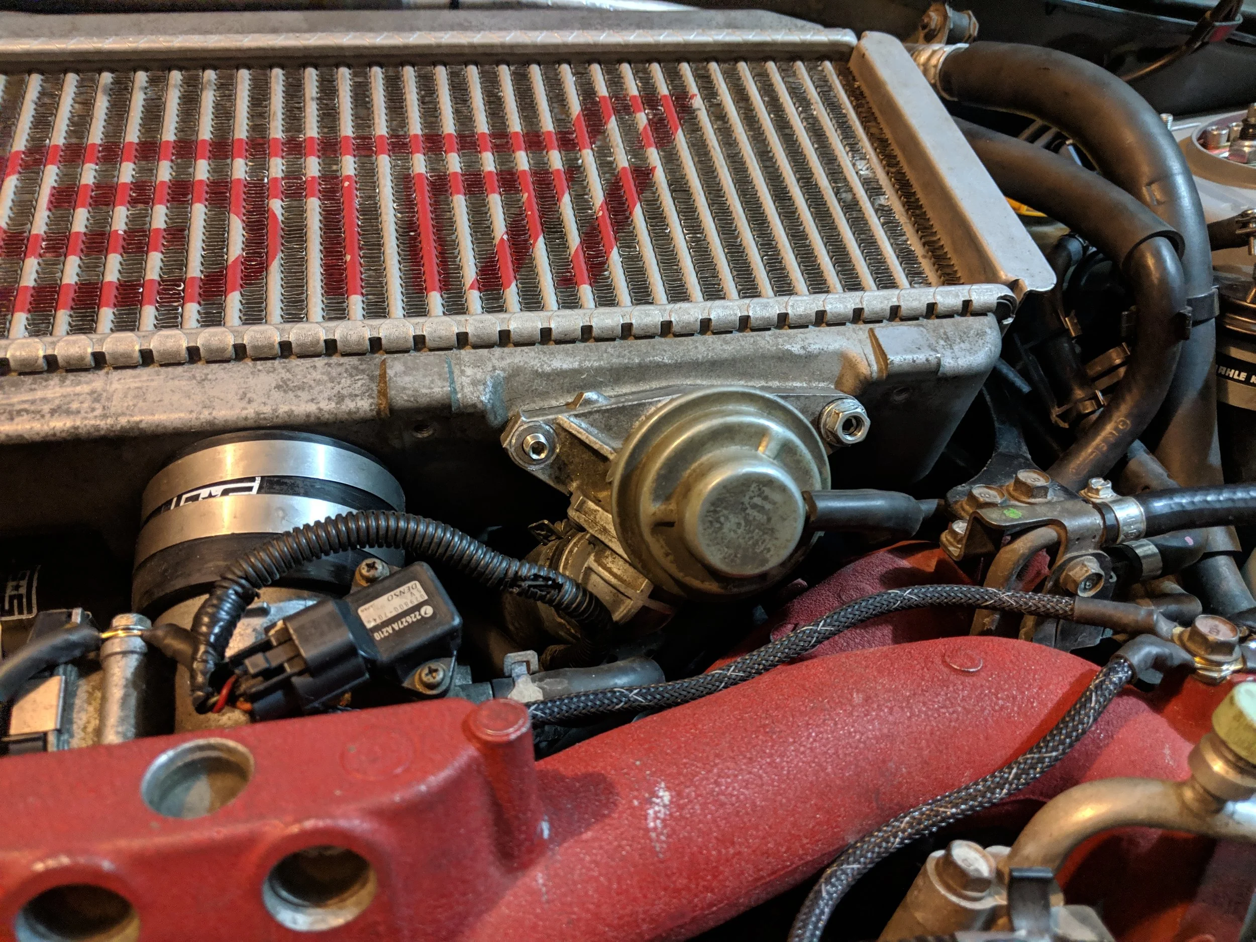 Bolting the Bpv down to move on to the tmic bracket bolts.