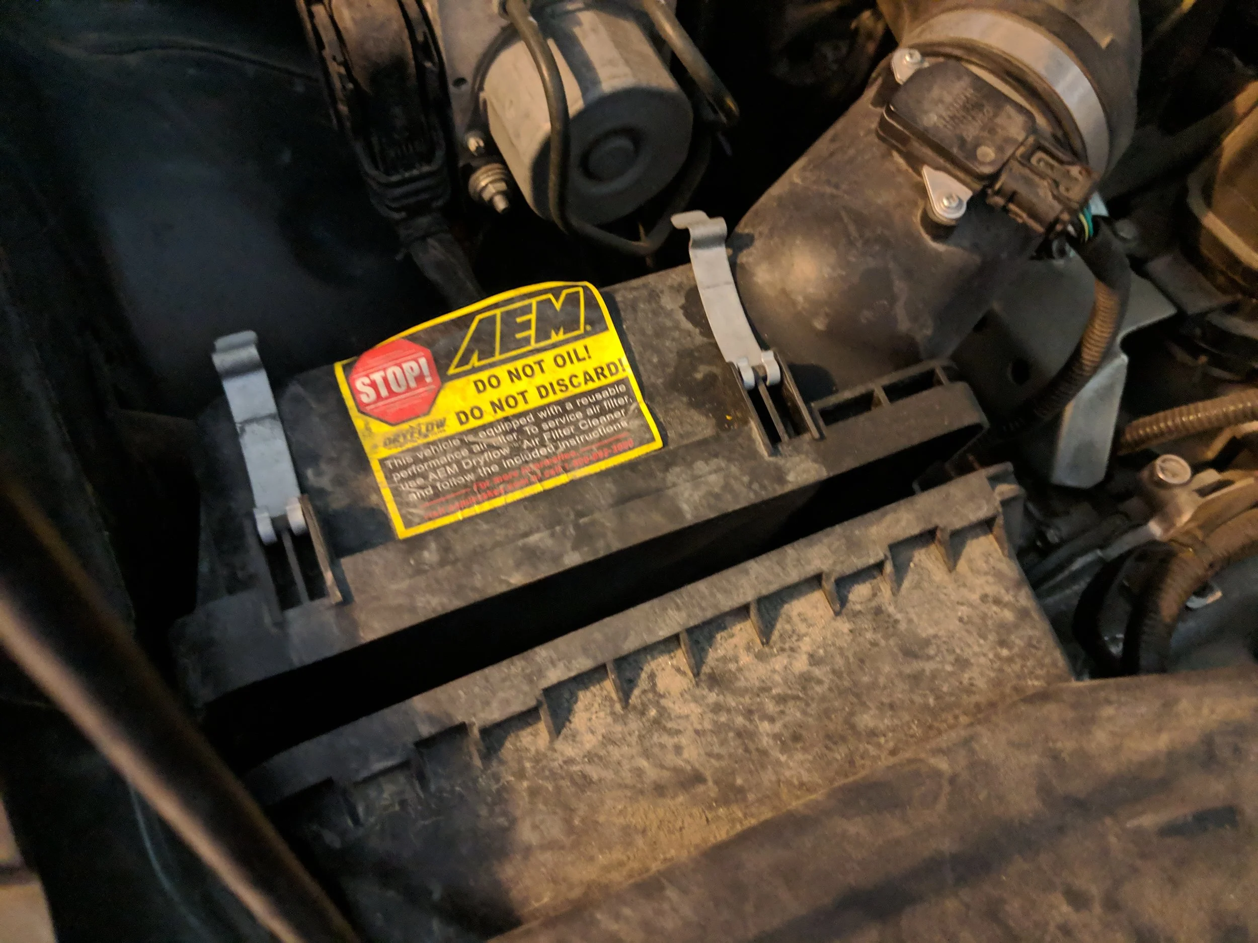 Working on the workhorse Subaru Impreza today. Opening up the airbox and removing the contents.