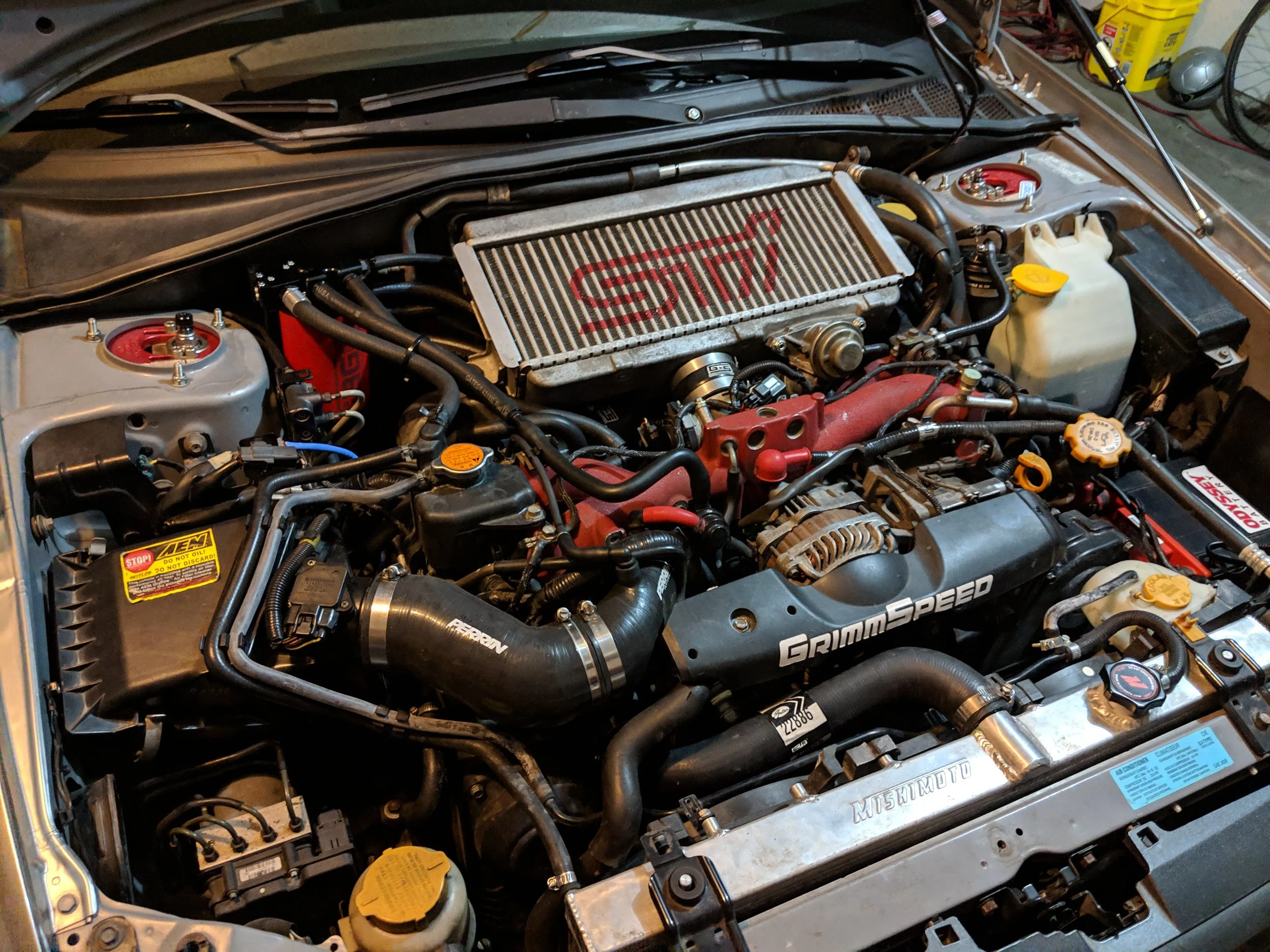 You can work around the intercooler if you like, but with as easy as it comes off I prefer to remove it.