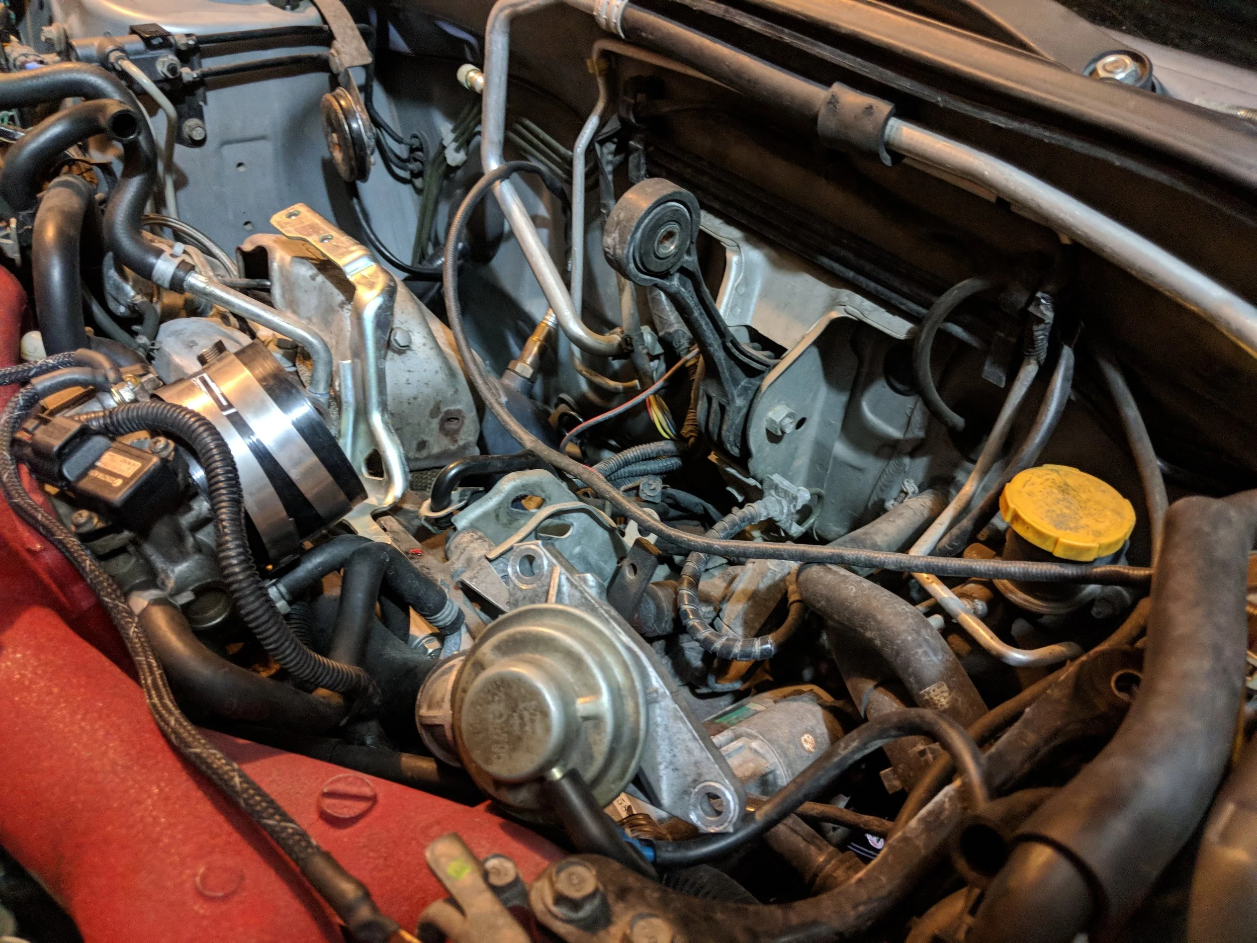Uninstall the tmic and dogbone mount. We will need to move the trans and engine to move up.