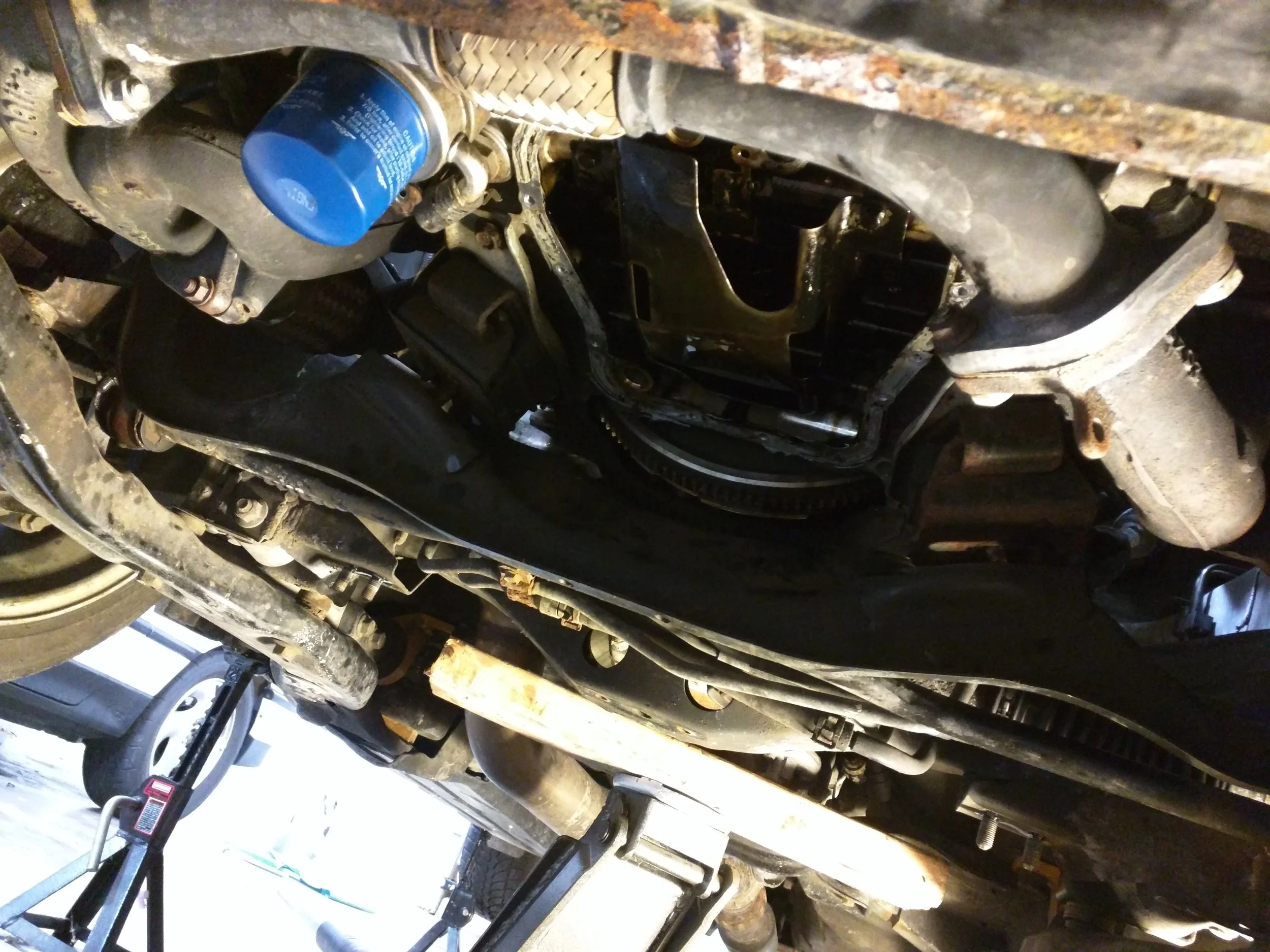 Exhaust manifold on, there is plenty of room to get these out.