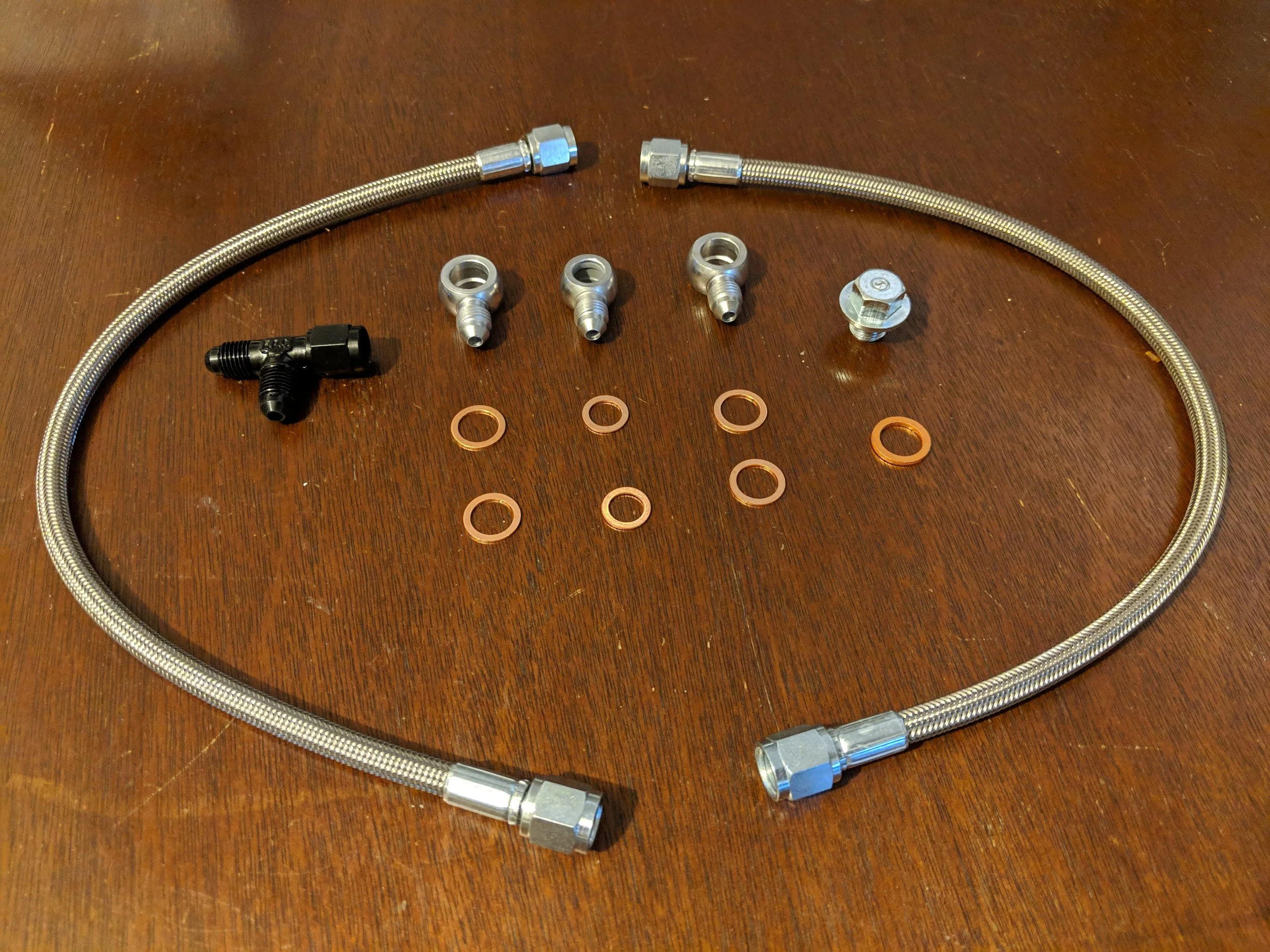 Iag steel braided turbo and Acvs oil feed line. Say good bye to your hardlines! 