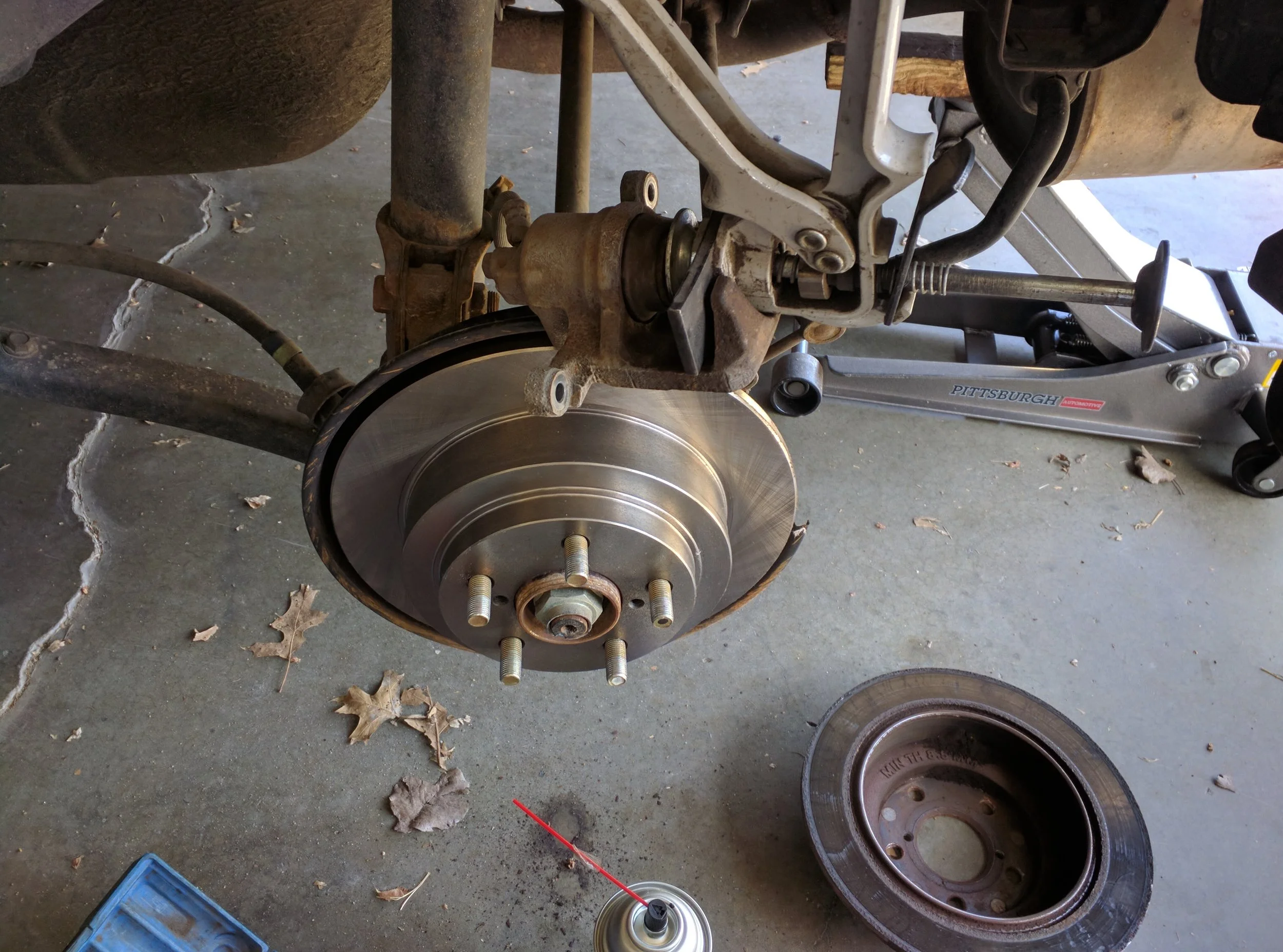 From my prior brake install, but here is the caliper and removed and the banjo bolt/brake hose connection point.