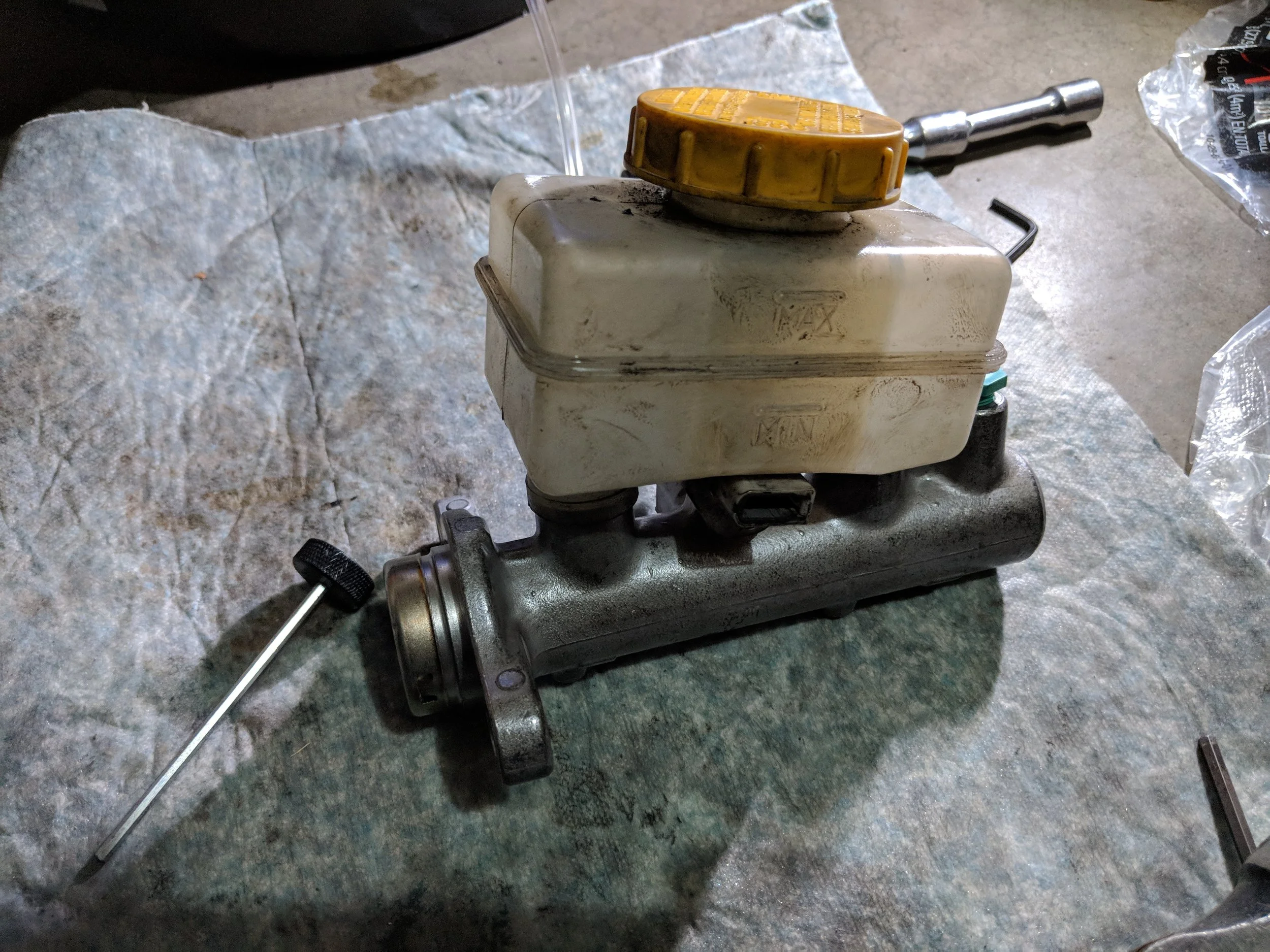 Don’t get too aggressive when bleeding the brakes it can ruin your master cylinder. I thought I did, but in the end I believe it was my hill assist engaging during the bleeding procedure. Make sure you car is very flat on your jack stands to hopefully prevent this issue.