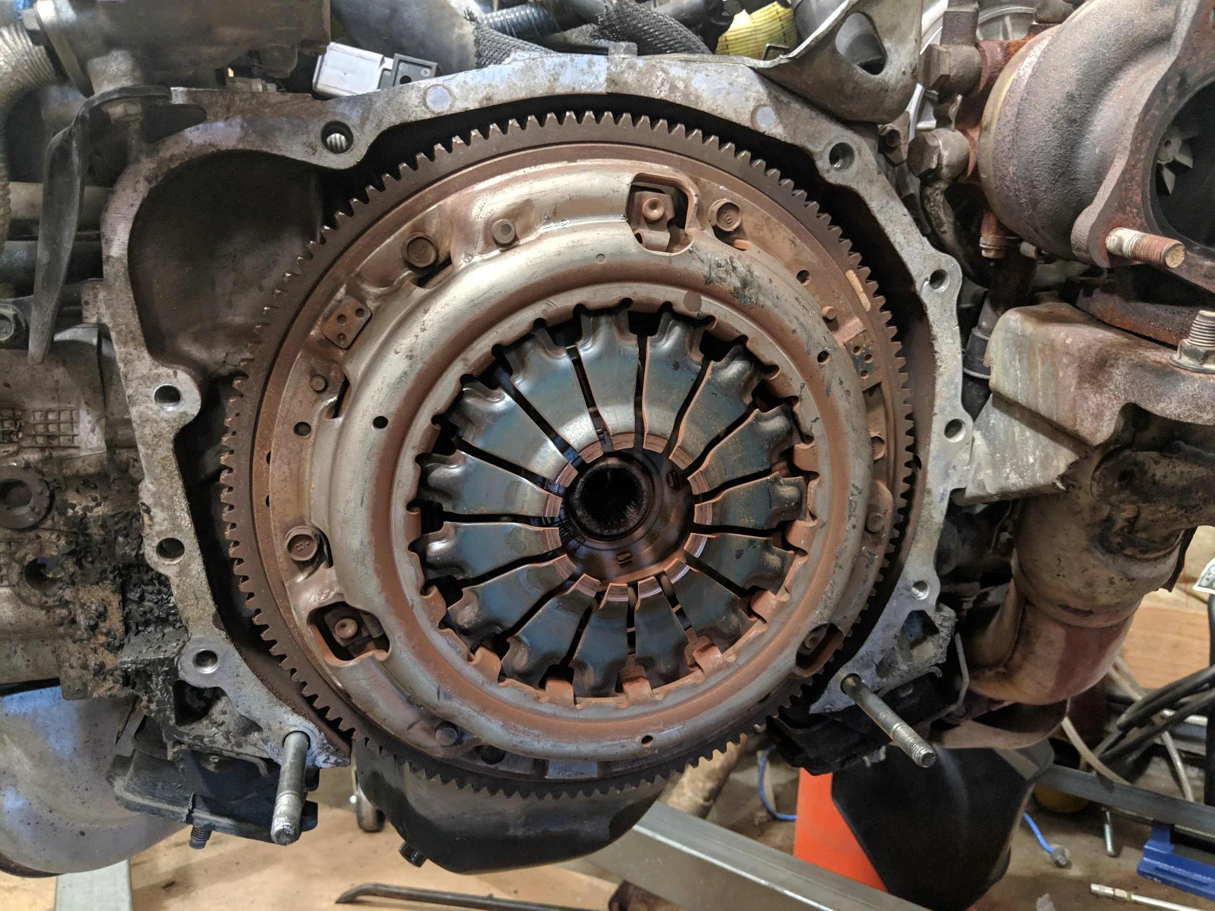 Old clutch ready to come off. Rusty and dusty.