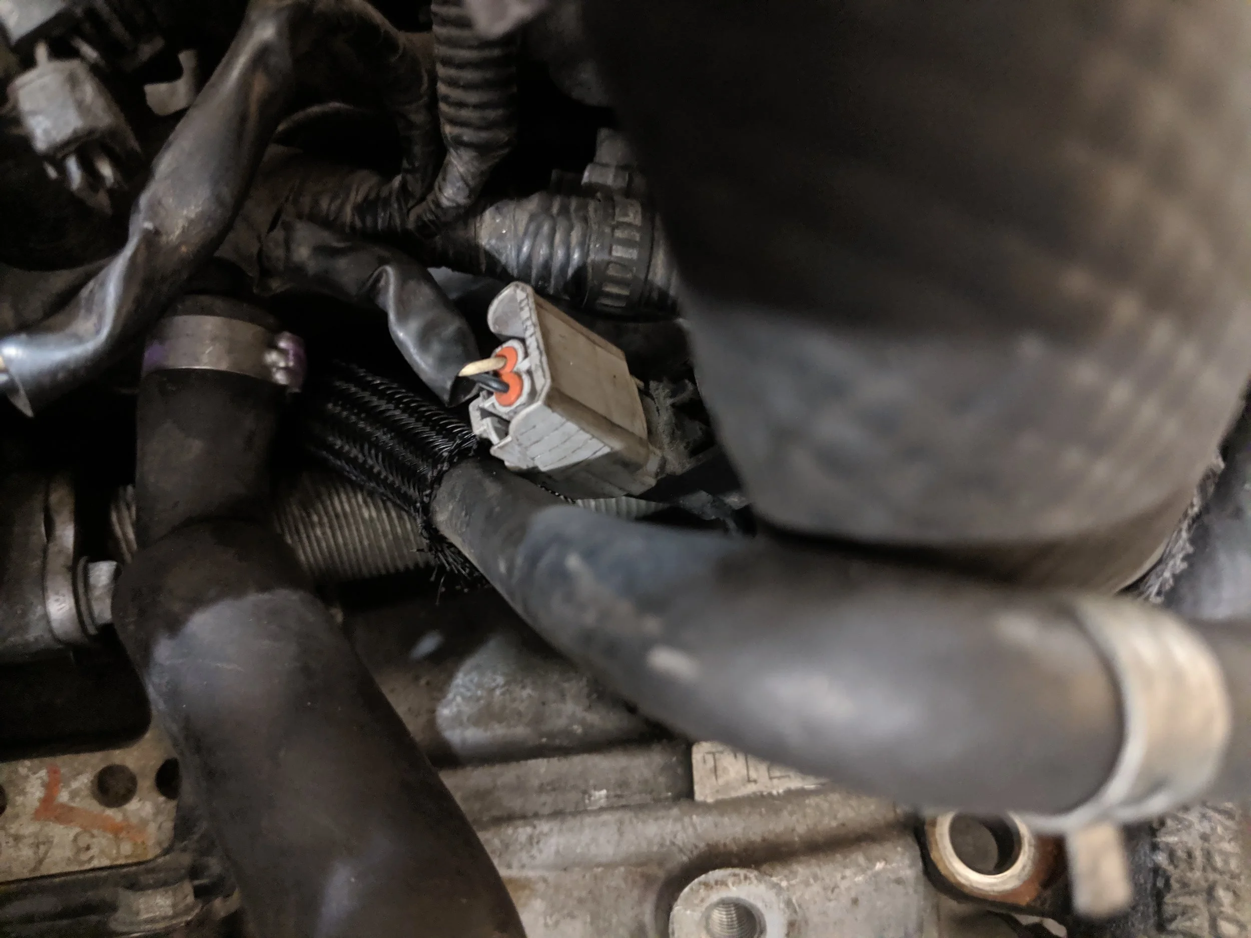 This connection and one more behind the driver’s side of the intake manifold.