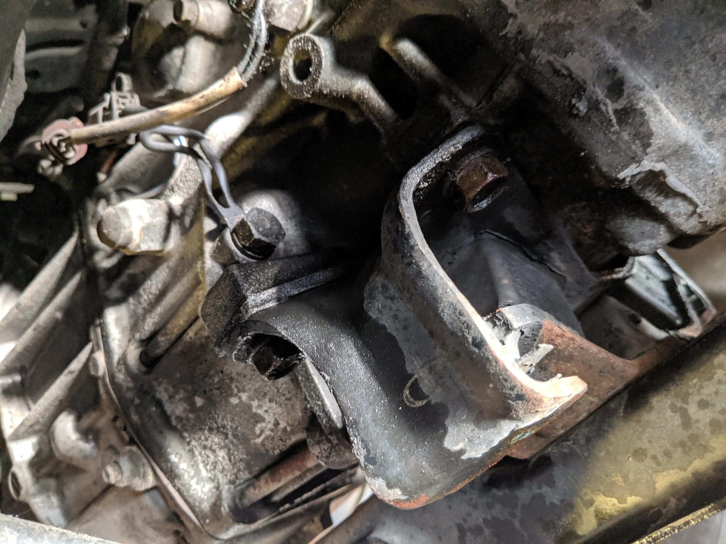 Here are the two driver’s side bolts.