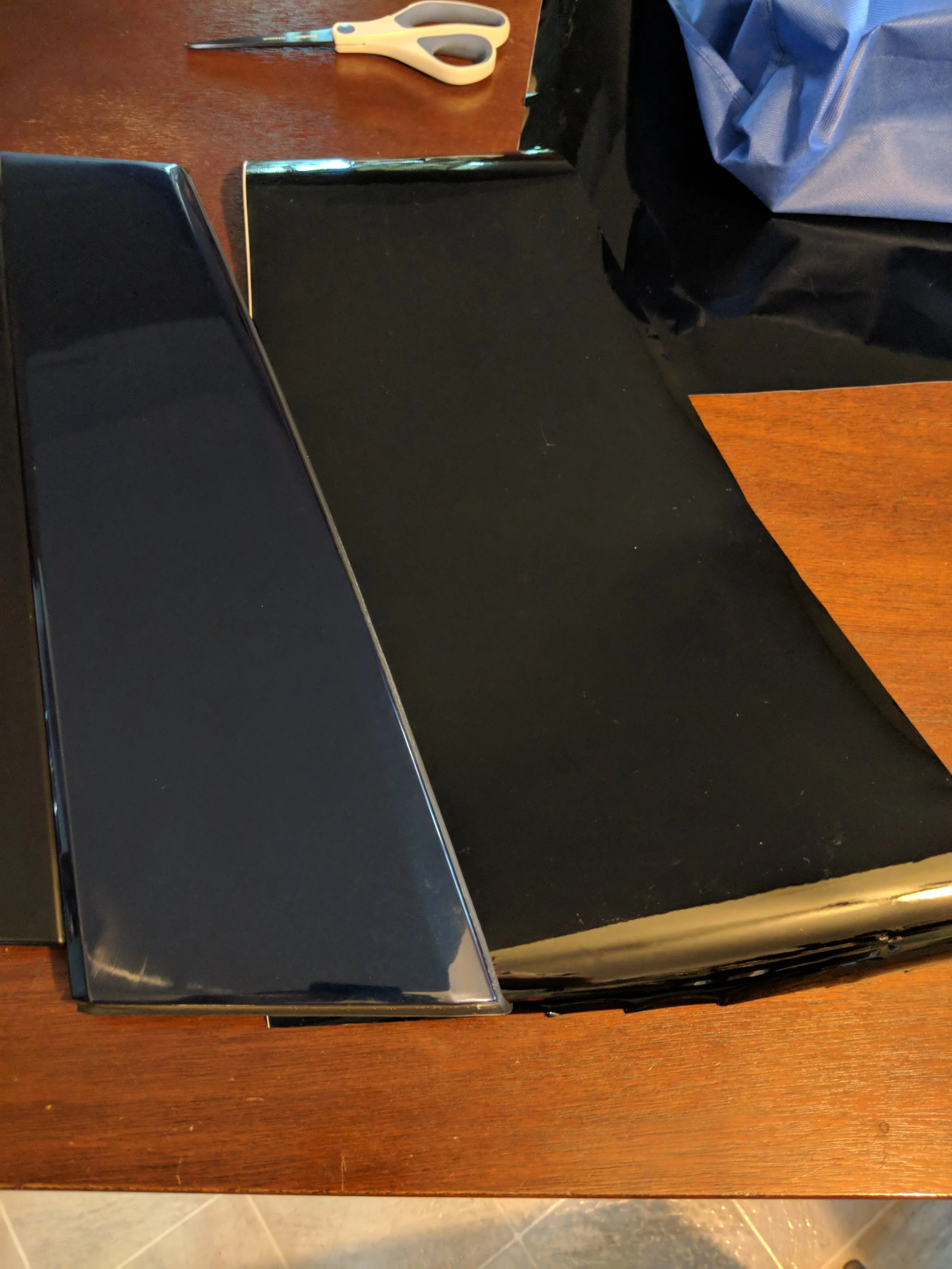 Rough cut. This should cover everything and make the vinyl easier to work with than trying to manhandle a large sheet.