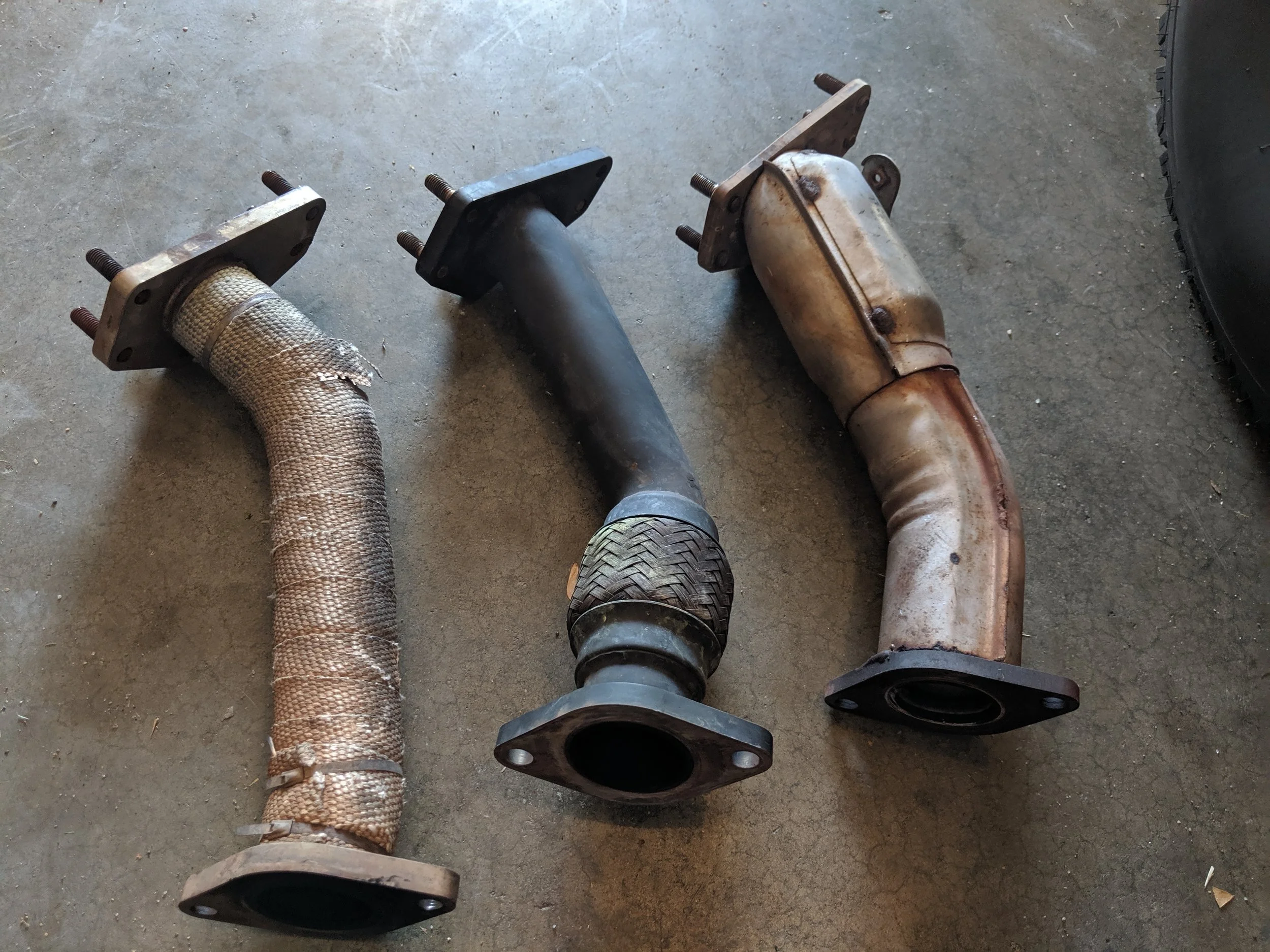 So many different choices for uppipes. Solid pipes, Grimmspeed flex jointed pipe and the factory catless. I prefer the Grimmspeed and then oem.