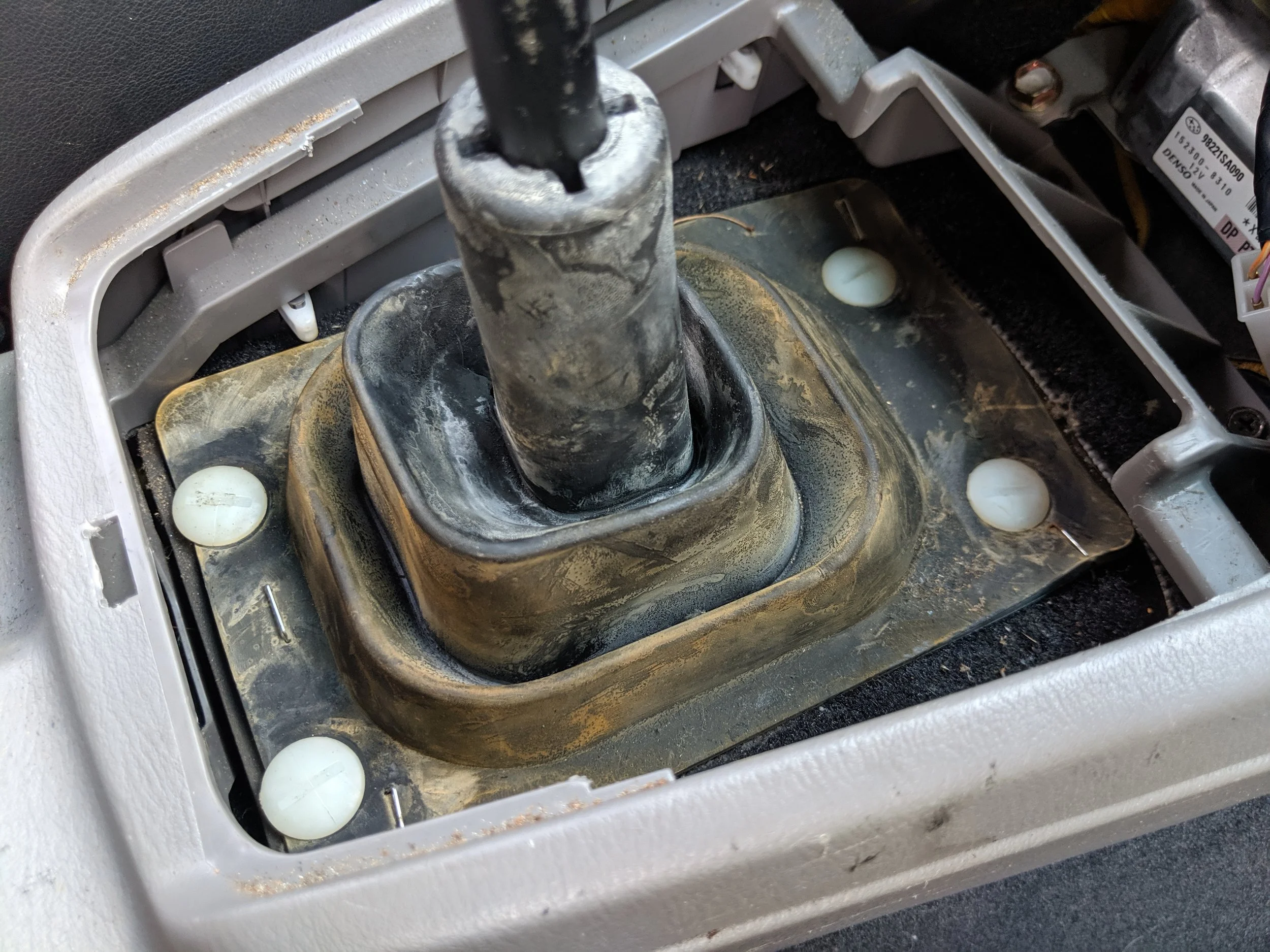 Now you can place the rubber boot back on and the clips can snapped down.