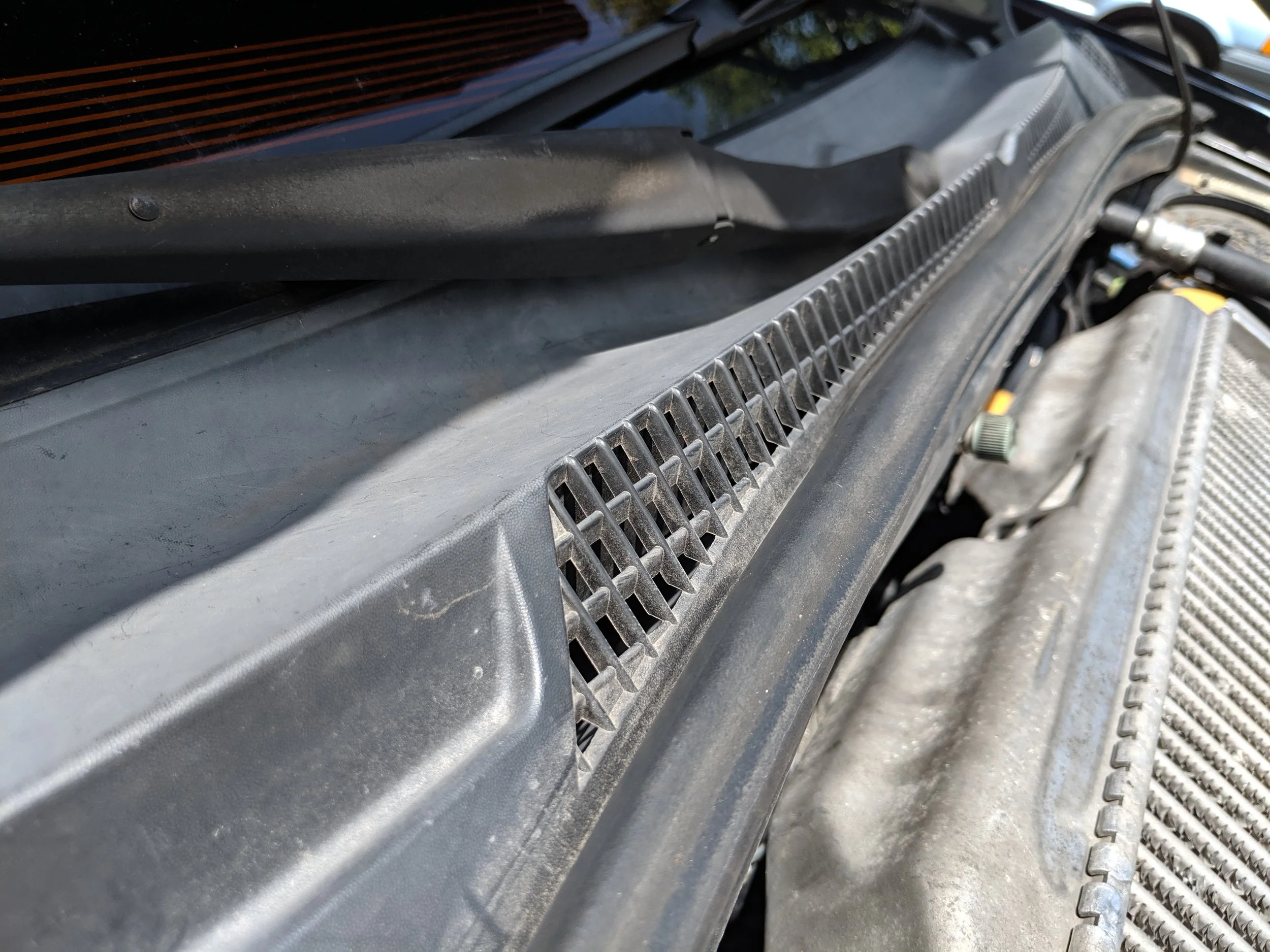 Here is the fresh air intake location. We will spray the remainder of the can down here and be good to go!