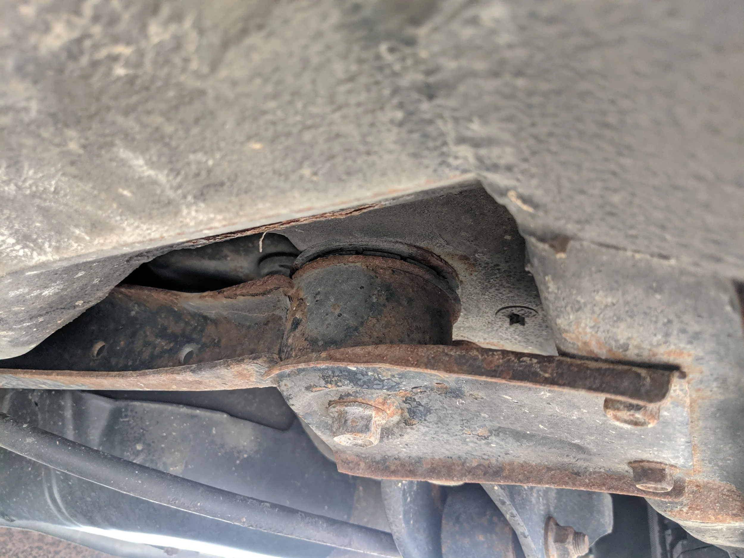 The area in question… Given the age of these cars, if you live anywhere where it snows you can expect a bit of rust here.