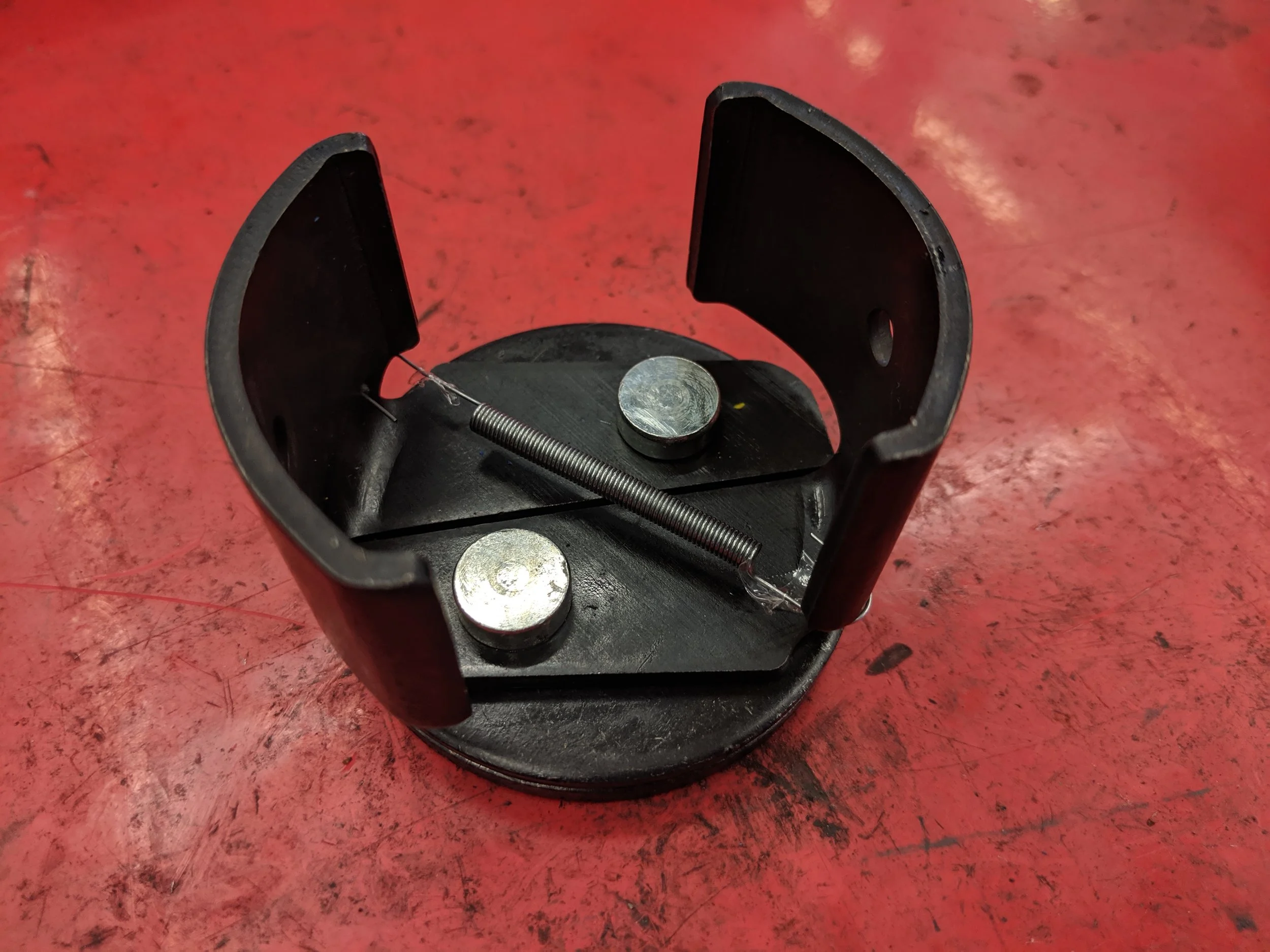 The Lisle oil filter clamp will help you remove stubborn filters. Once attached to a extension or ratchet you can easily rotate the filter loose.