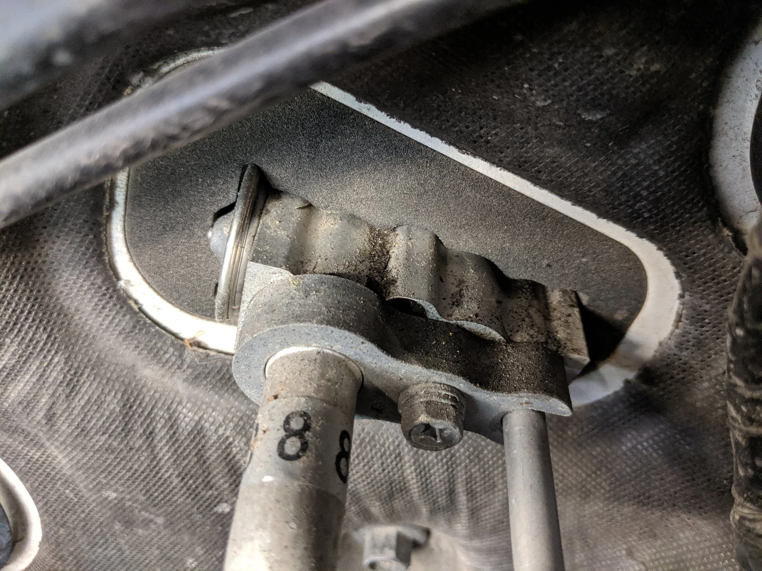 The oily look of the expansion block on the fire wall could possibly be A/c dye. Double check it with your Uv light.