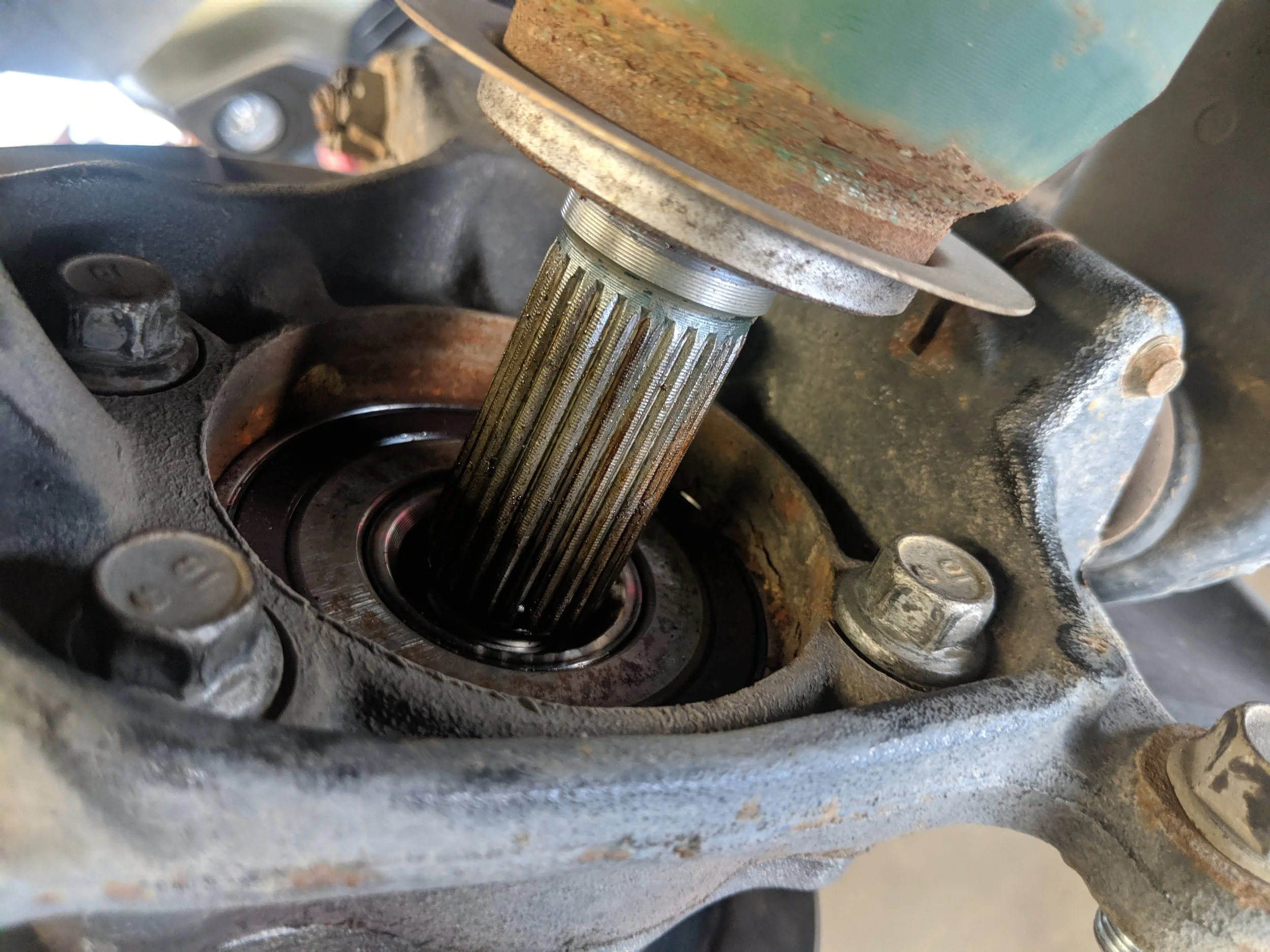 Here are the bolts, with all four removed you can commence to bearing removal.