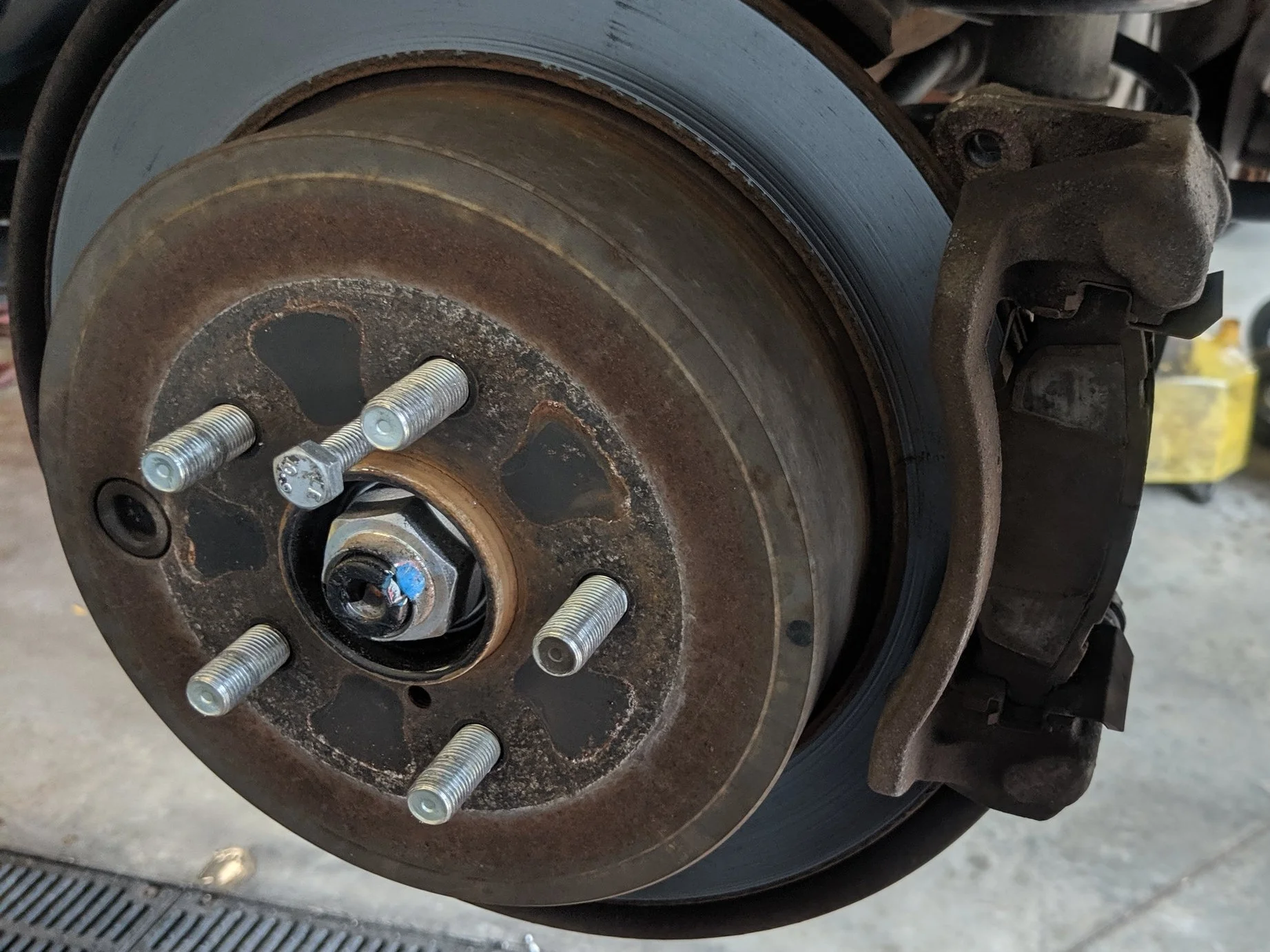 Residing on the rotor there are threaded holes for easy removal.