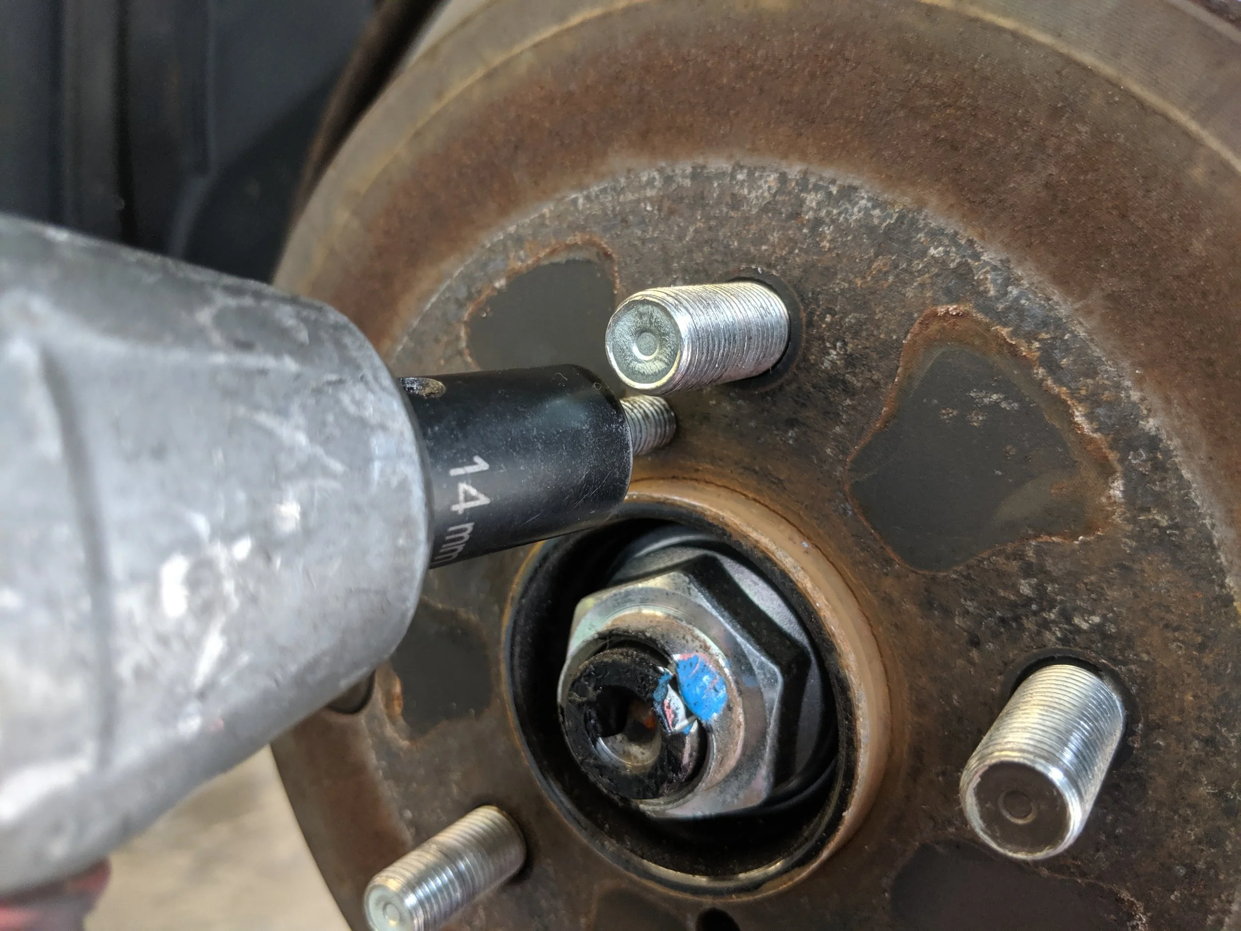 Powering it off! Swap side to side if you feel like the parking brake shoes are dragging and being pulled out.