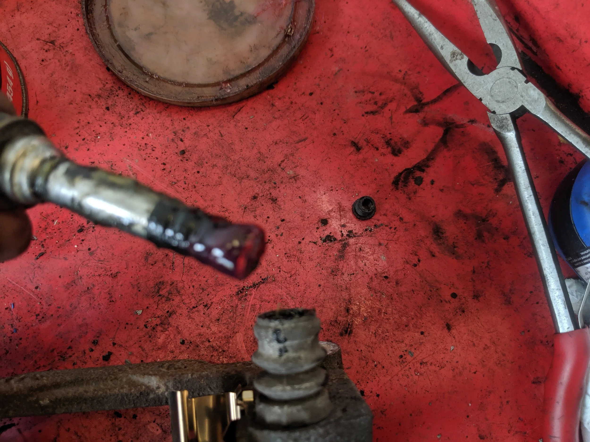 Greasing up the slide pin for installation.