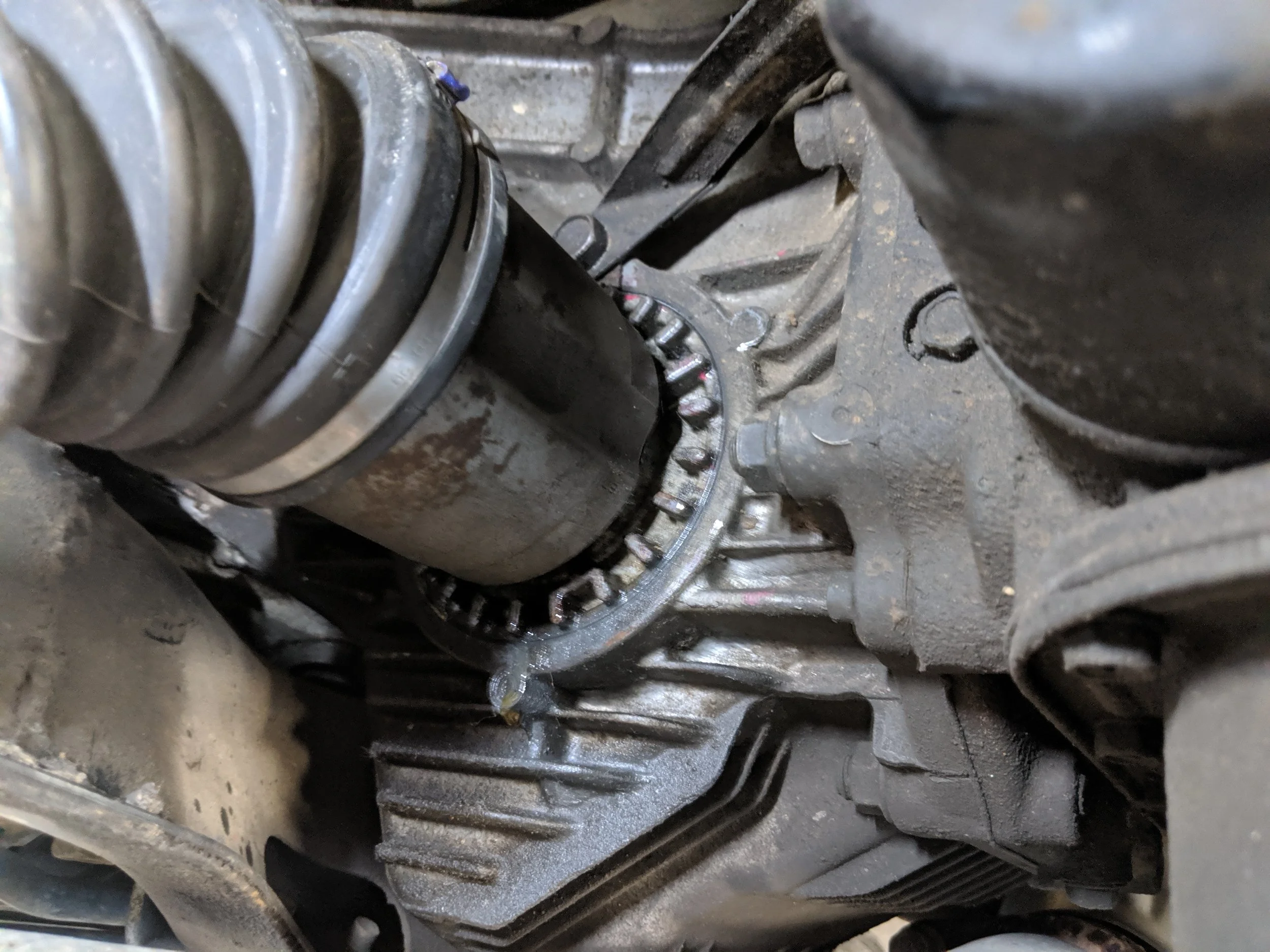 Axle back in the differential. Give it a slight pull with your hand to make sure it is seated.