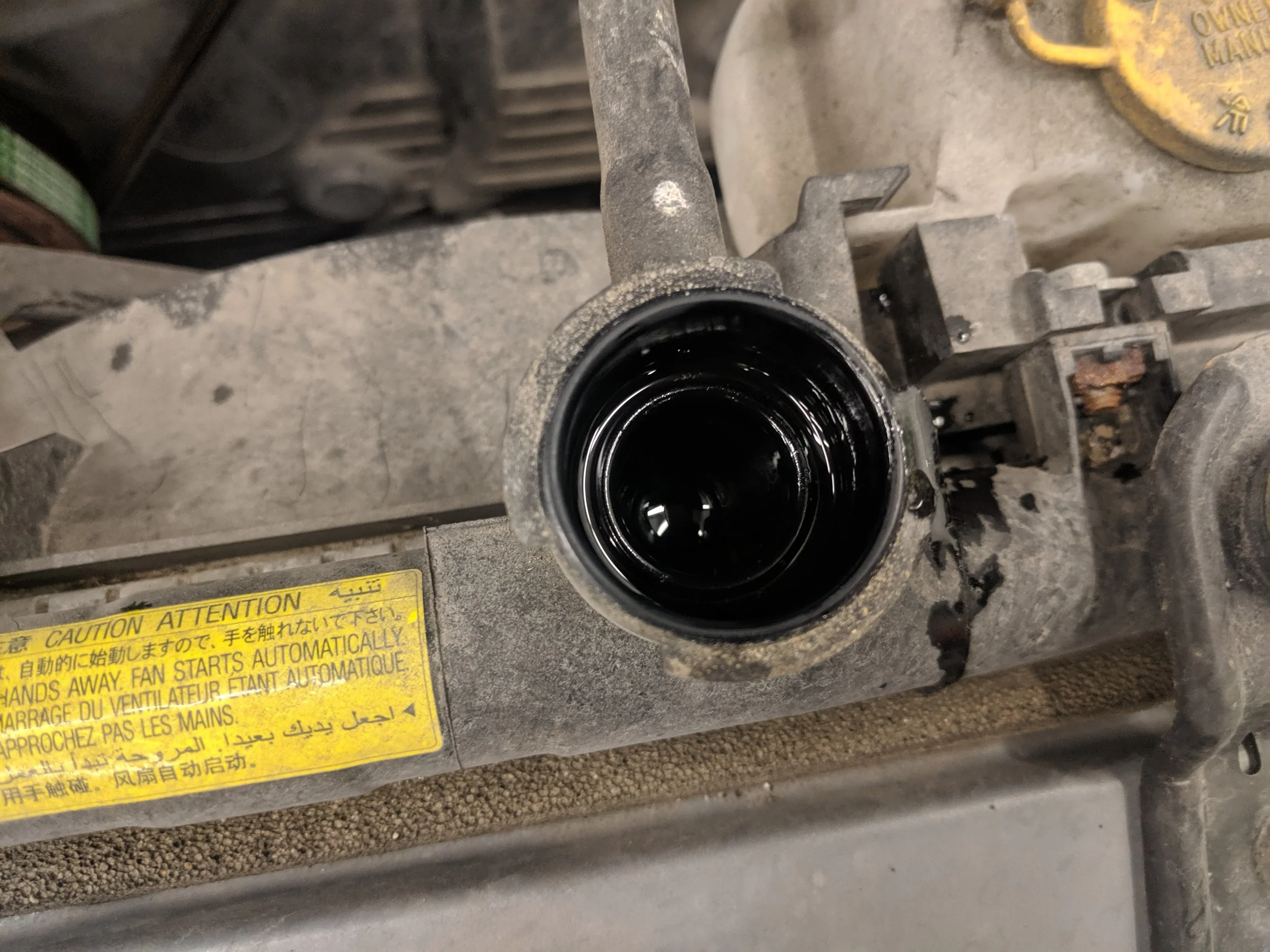 Cap off, let’s drain the coolant.