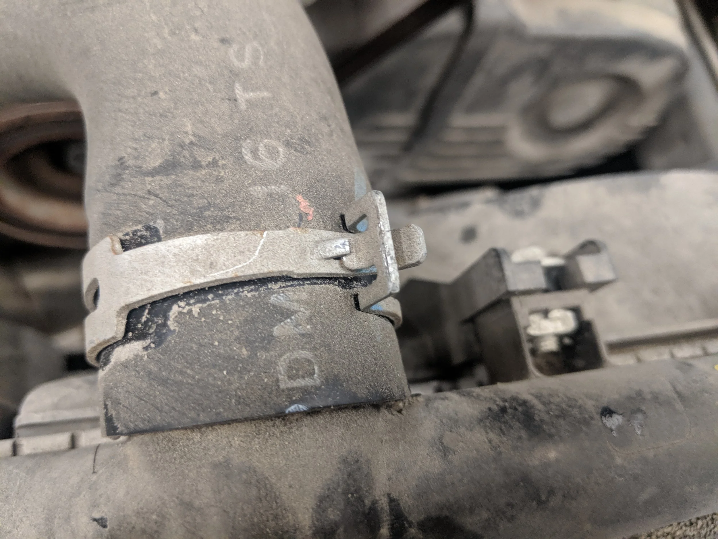 With the coolant drained remove this clamp to allow your radiator hose to be moved out of the way.