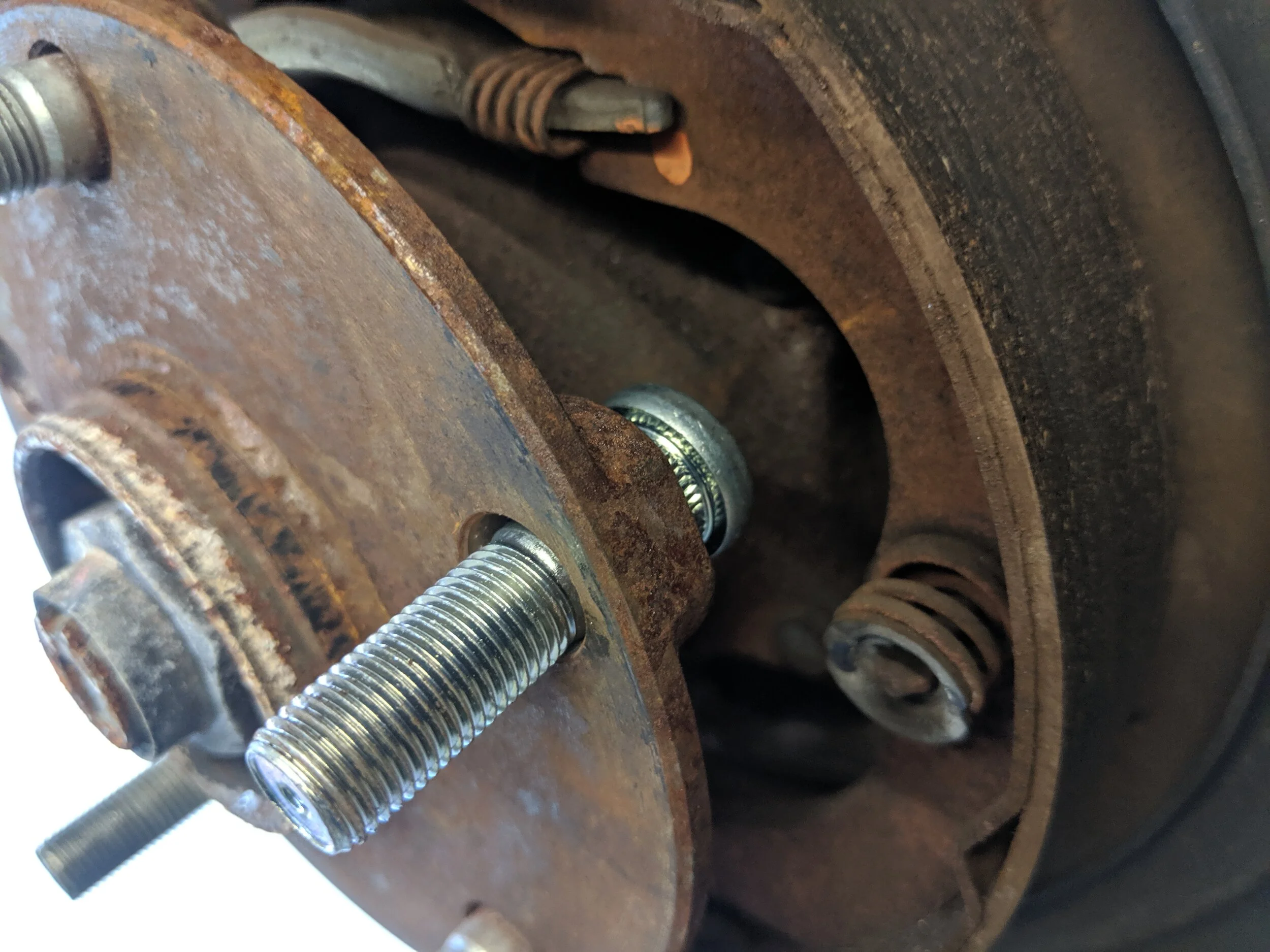 With the old stud out the new stud can be placed in its home.