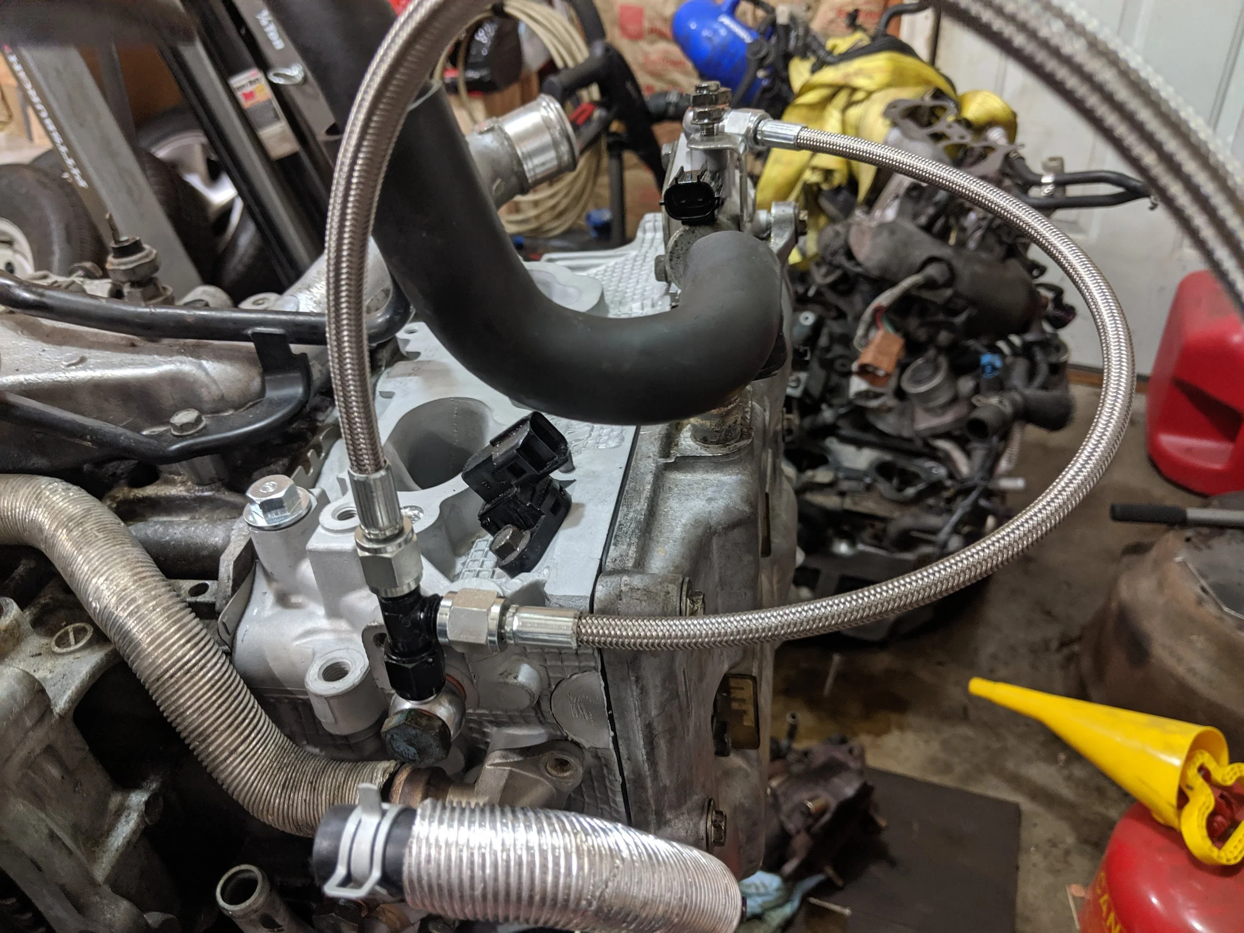 IAG's braided turbo oil line install. More flex for less breakage. 