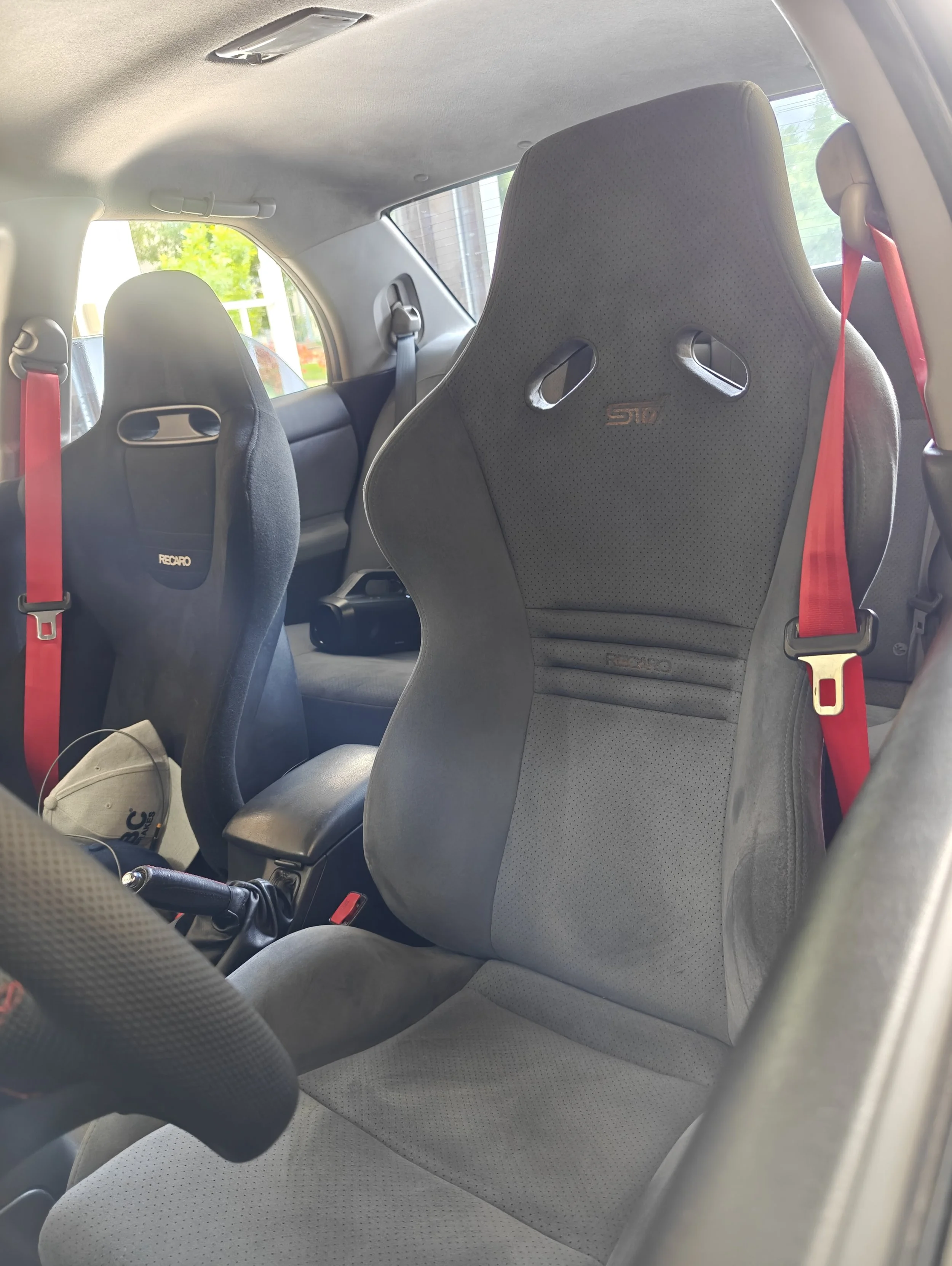 Subaru front seat belt replacement! Because nothing says racecar like red seat belts.